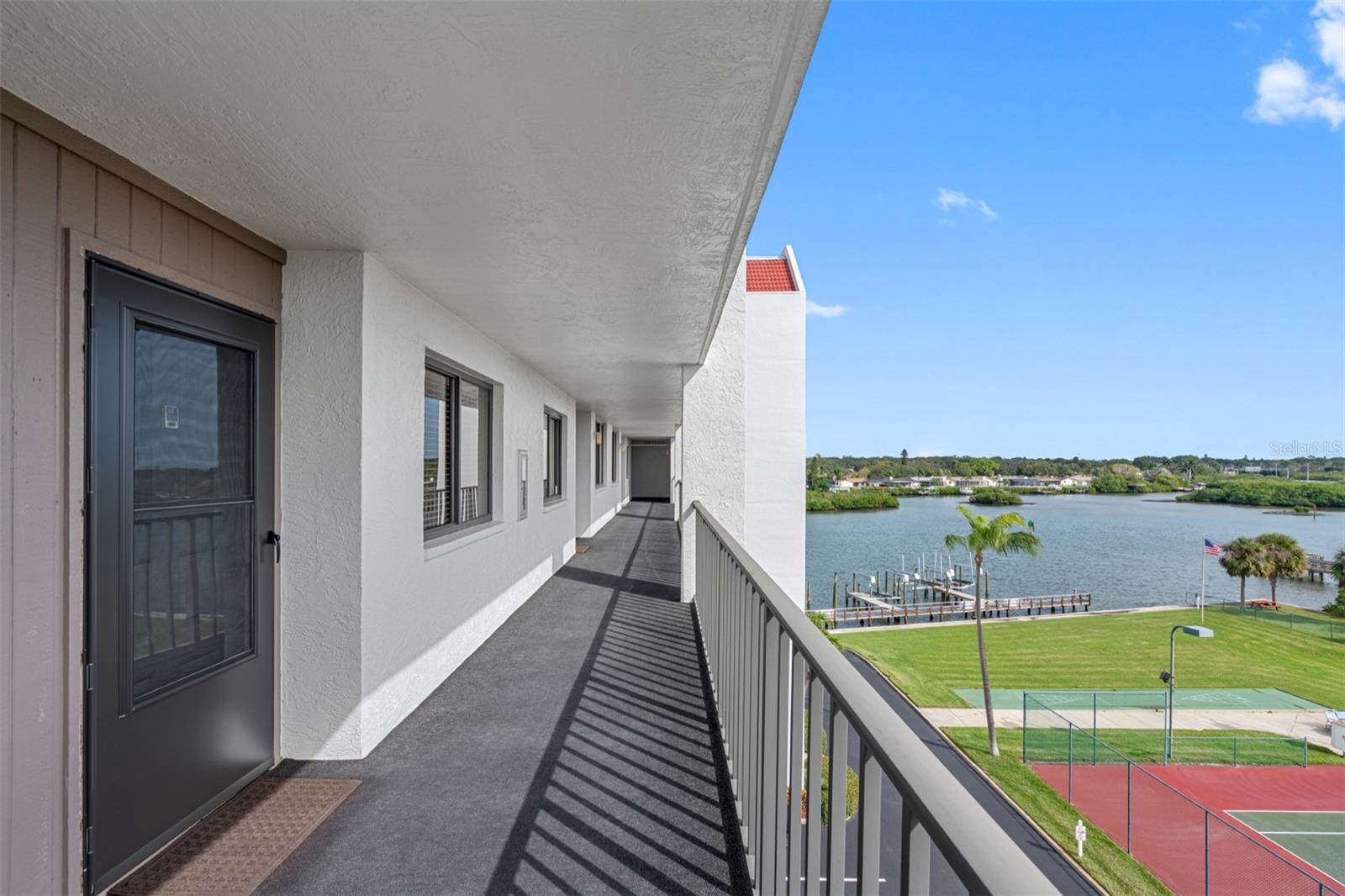 .. Residence # 512 Front Walkway has a Southern Exposure. Perfect for watching the Tennis Matches and Sunsets 6 months out of the year..