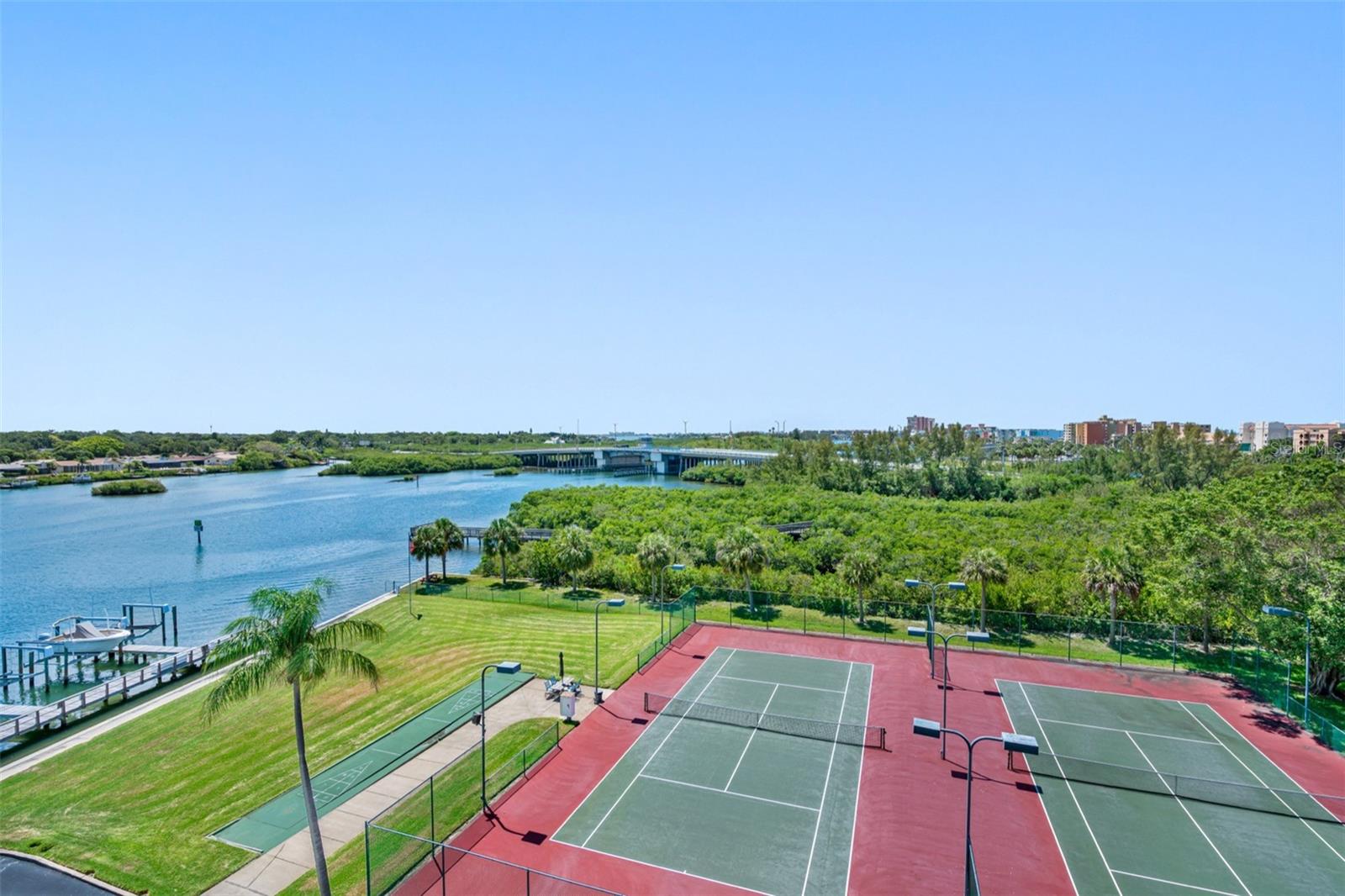 ... South West Exposure is sought after from Winter Guests. Unit # 512 has just that.. And not a bad seat to Pickle Ball if you are so inclined. NOTE: Shuffle Board Court next to Tennis Crt.