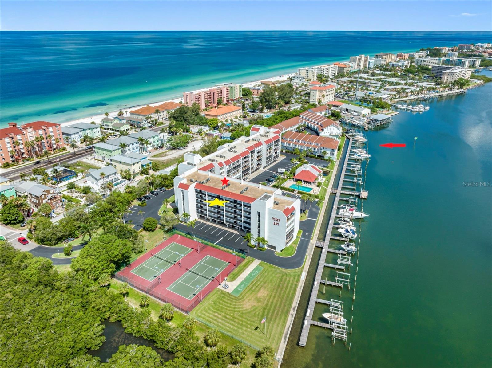 .. Aerial of Indian Shores Florida Looking North past Vista Bay Condominiums. Small Town feel. Semi private Beaches due to a lack of parking parking due to topography of Indian Shores.