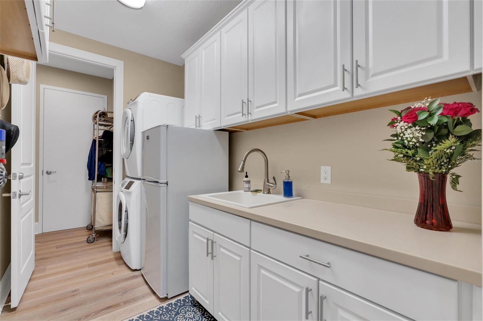 Laundry room with additional storage