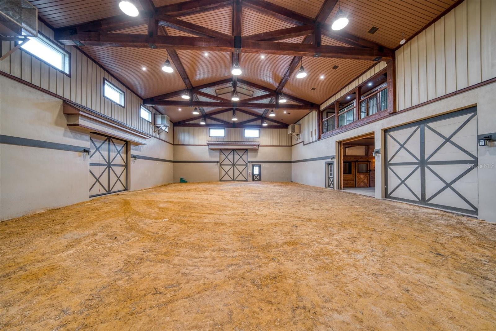 Covered Arena - View of the Barn, Catering/Garage Area, and Balcony for Living Quarters