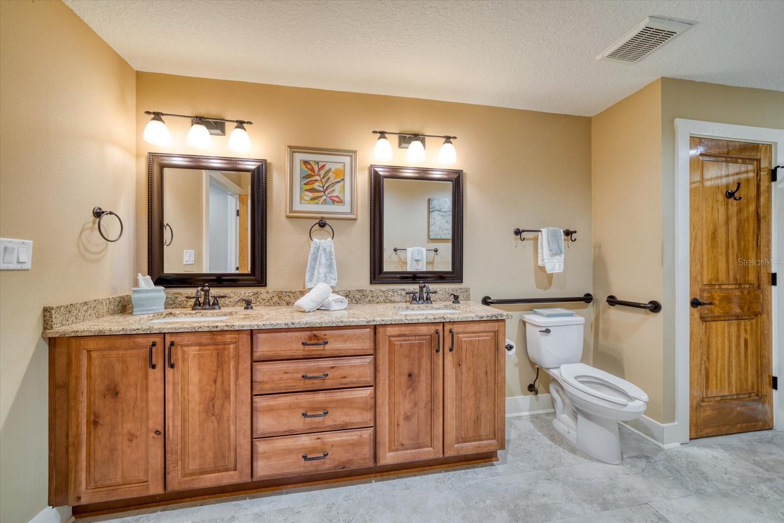 Full Bathroom with Double Sinks and Walk In Shower