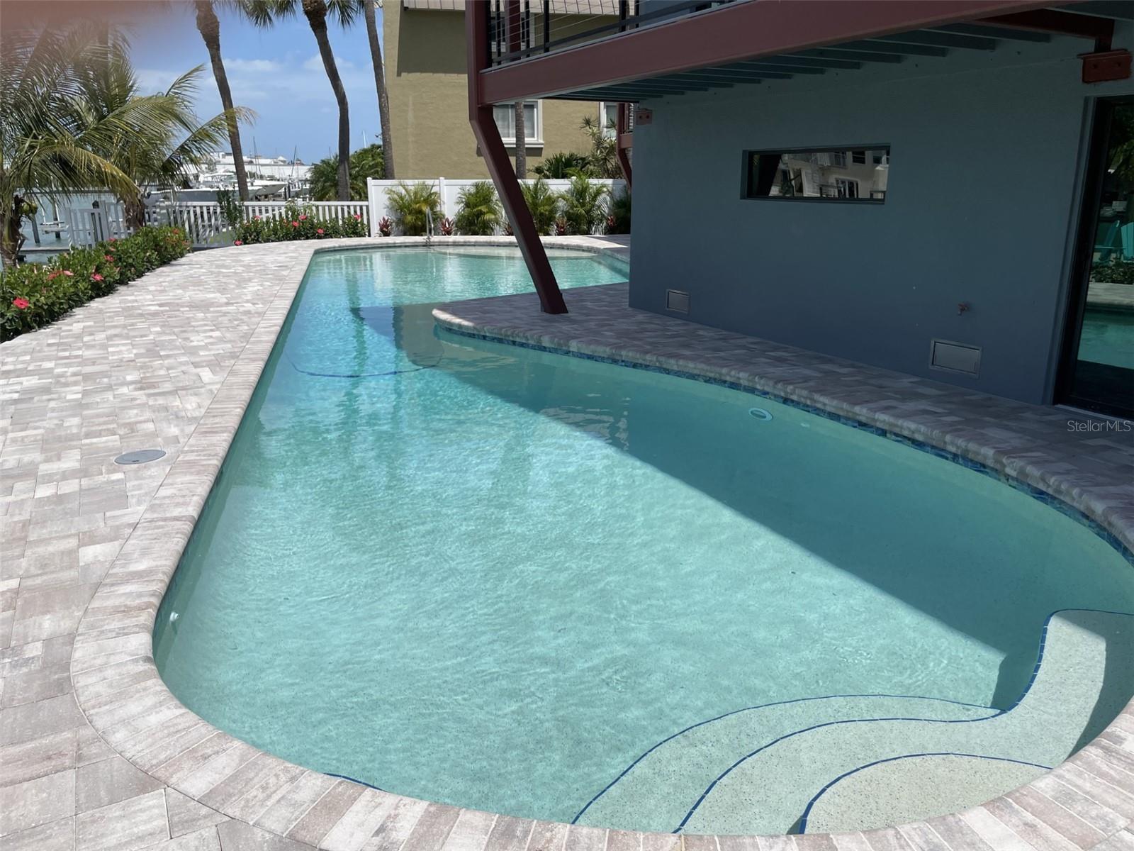 Stairs on both ends of pool