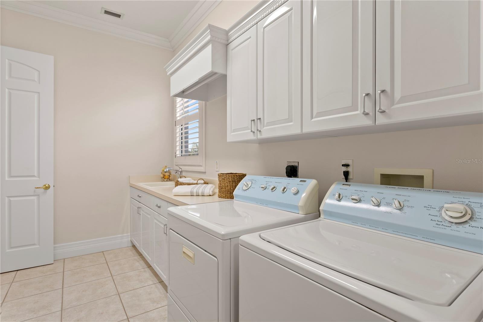 Walk in Laundry Room with Wet Sink