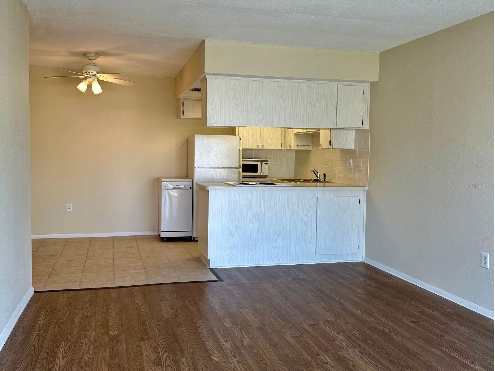 This open floor plan condo exudes cozy vibes with updated paint and floors. Ready for you to call home.