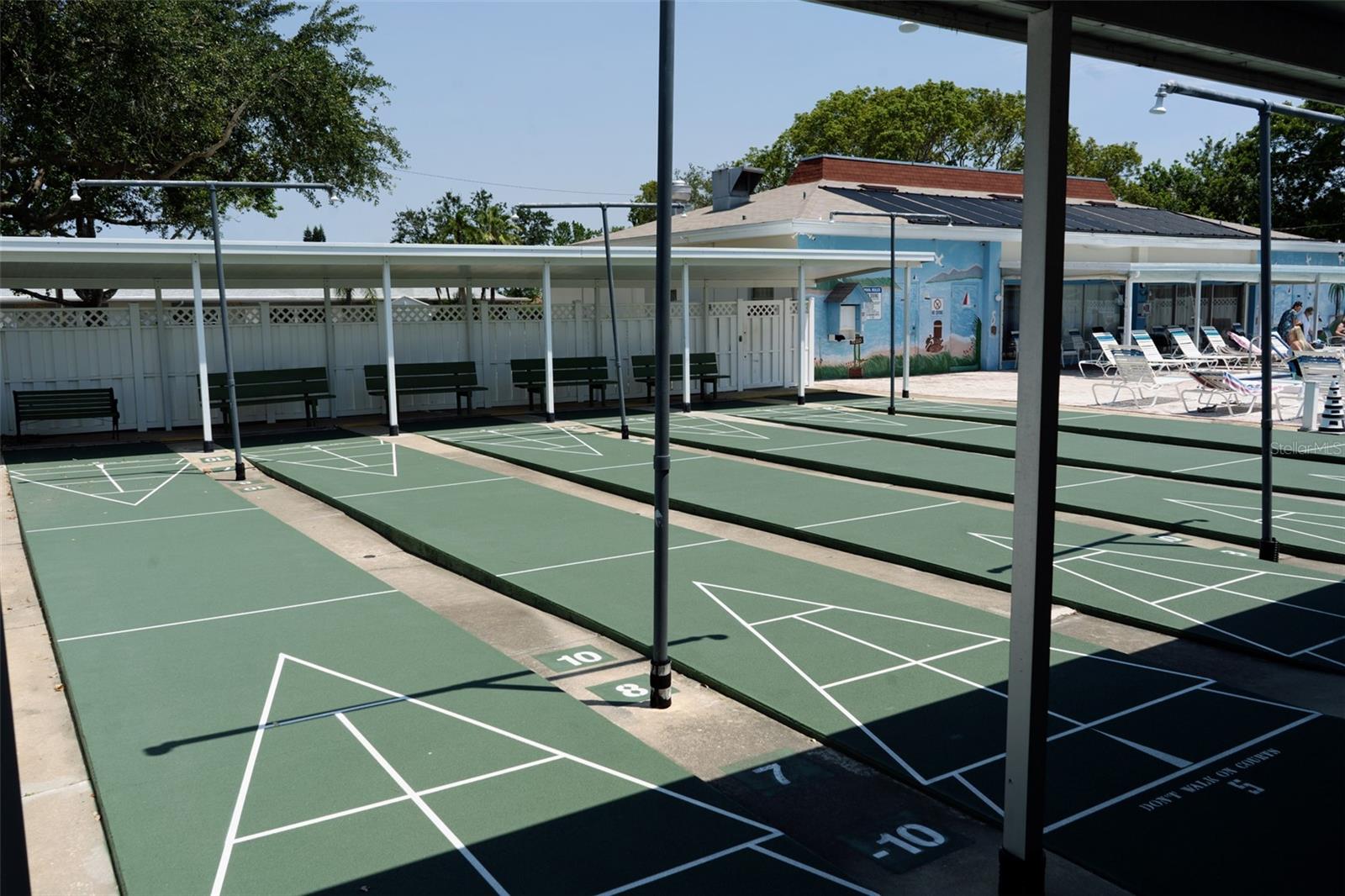 Shuffleboard fun awaits! Embrace leisurely afternoons enjoying a game of shuffleboard with friends and neighbors in your vibrant community.