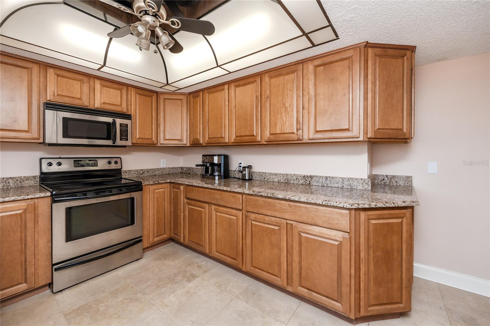 Lots of countertop space and cabinets for storage.
