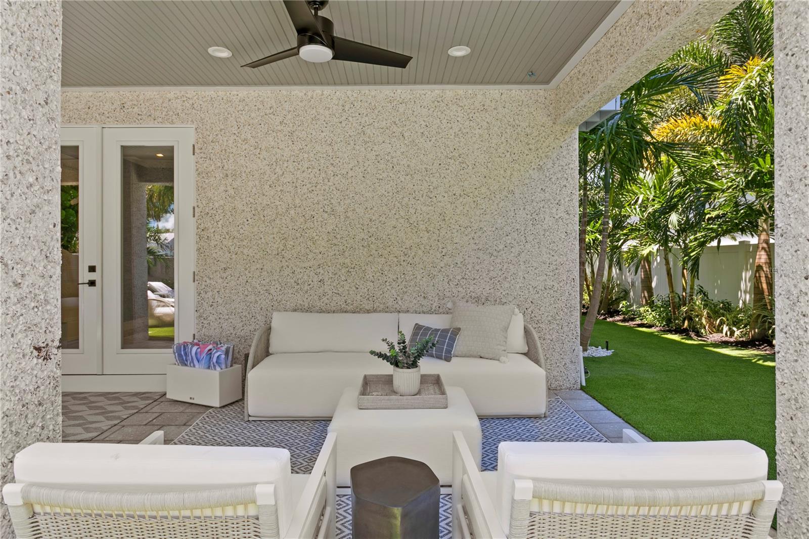 Large Covered Lanai with can lighting and fans for entertaining all year round