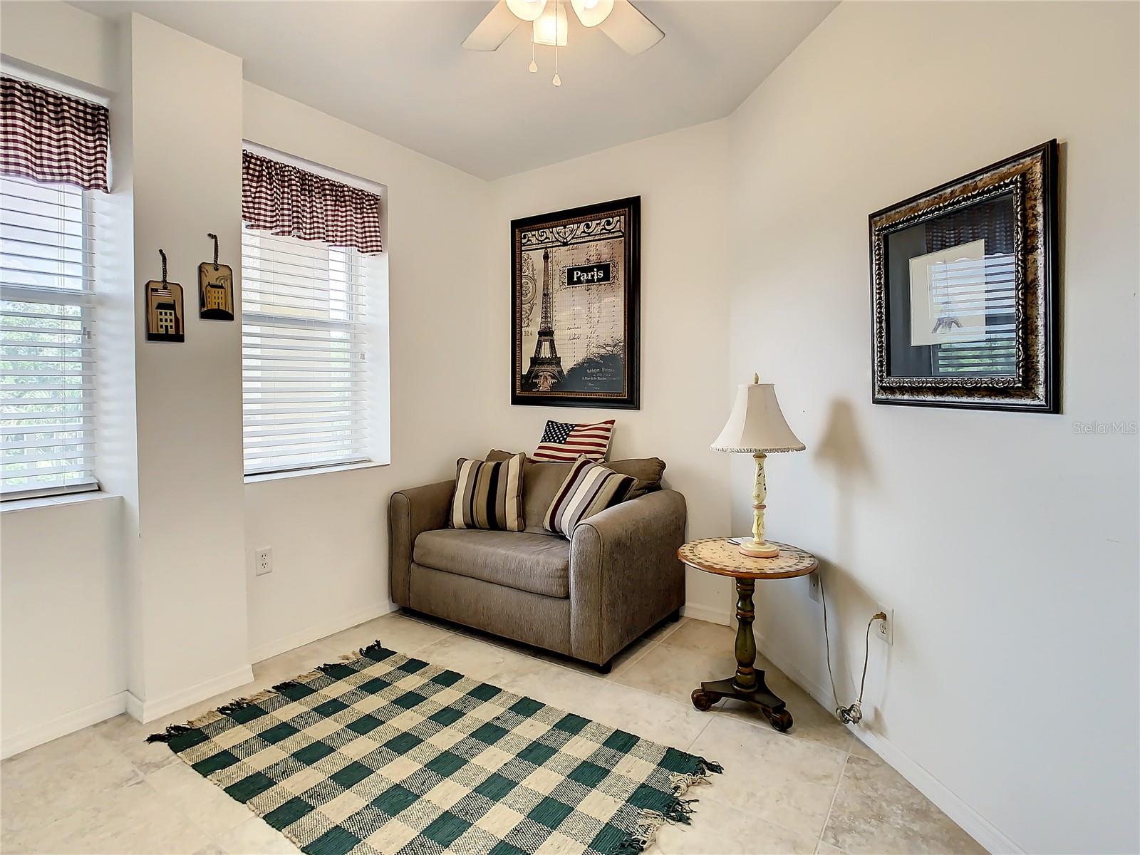 The third bedroom is located at the front of the home with stylish French doors making it perfect for an office or den