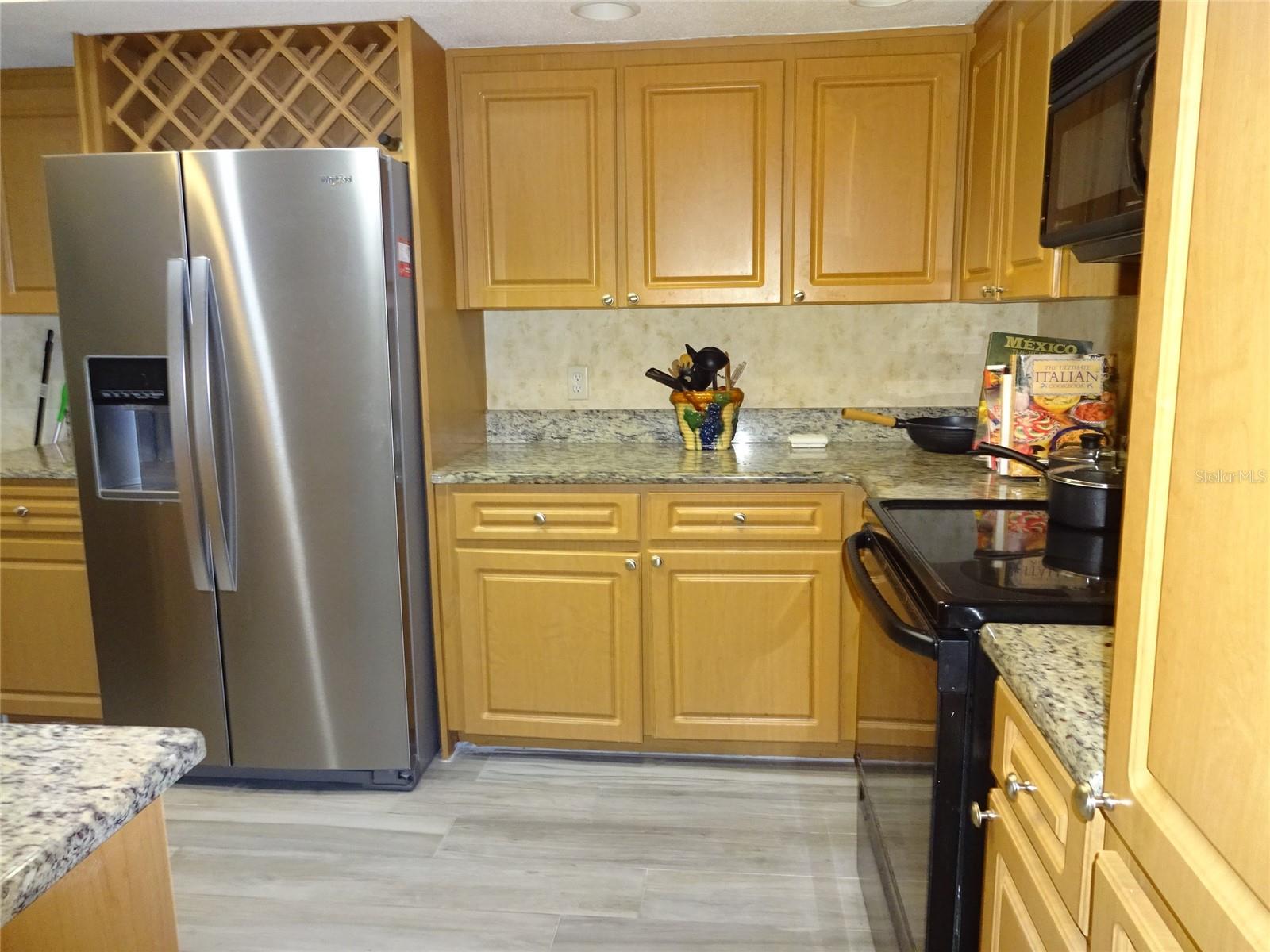 Kitchen....cabinets are brown oak wood...(not yellow)