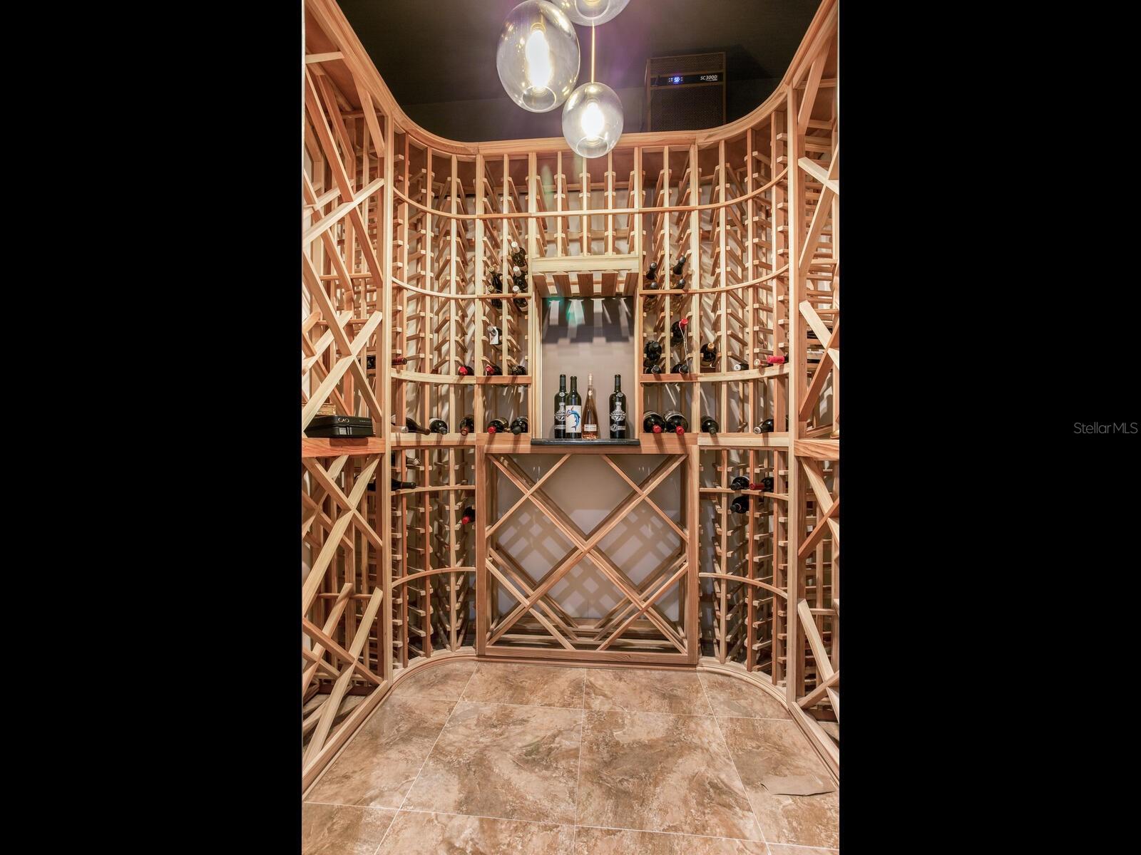 Wine room by game and media room