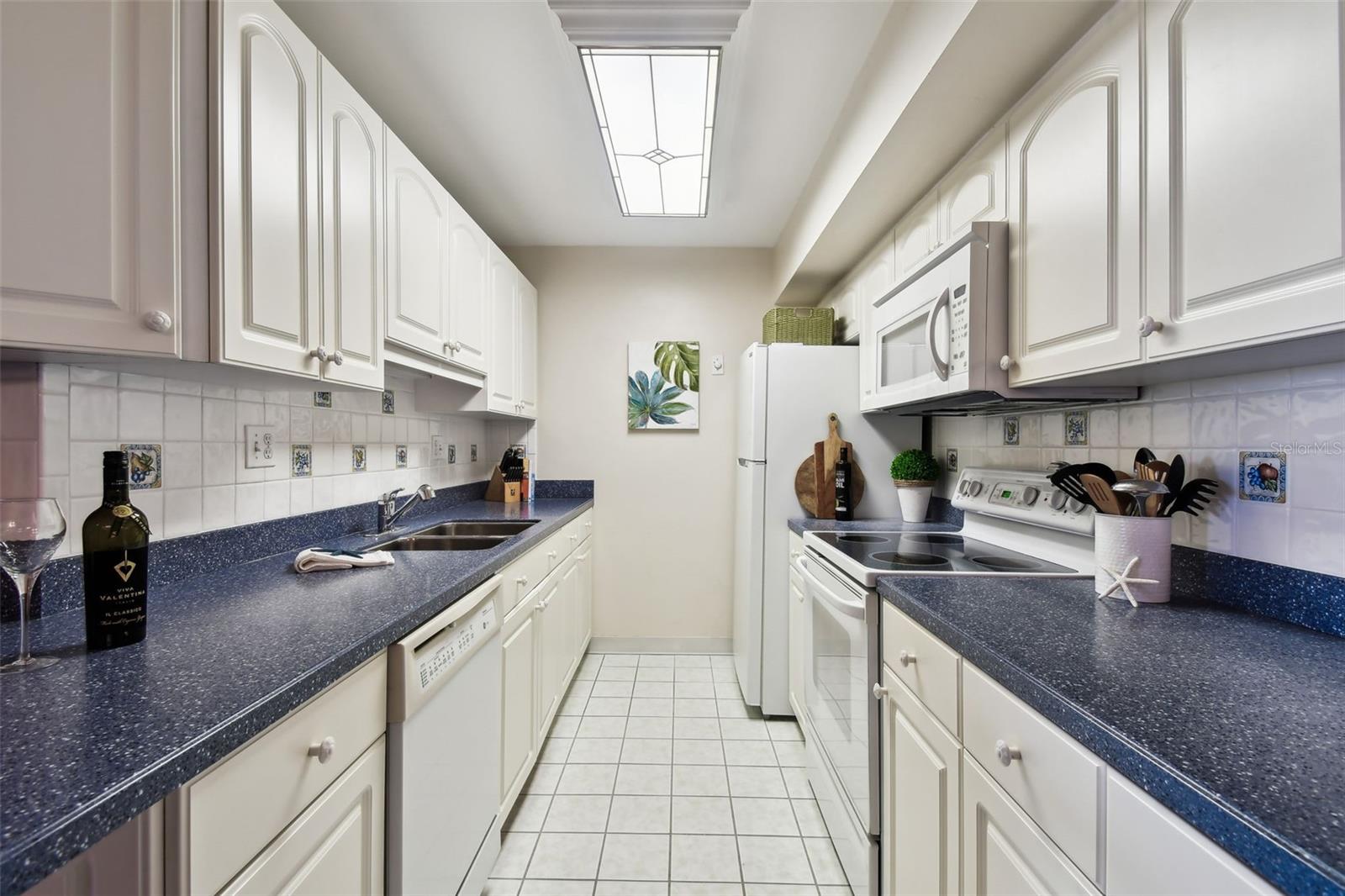 Bright kitchen w/Corian countertops