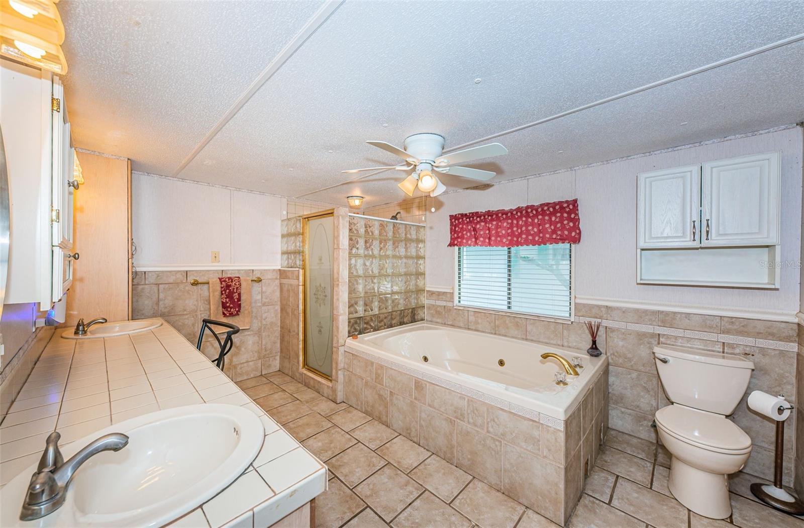 Bathroom with shower and oversized soaking tub