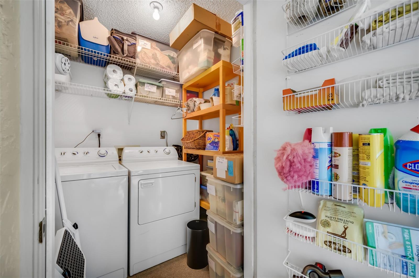 Laundry room includes full size washer and