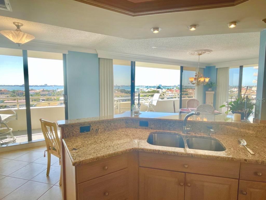 Bay & Gulf views, breakfast bar, access to 75' balcony from most rooms.