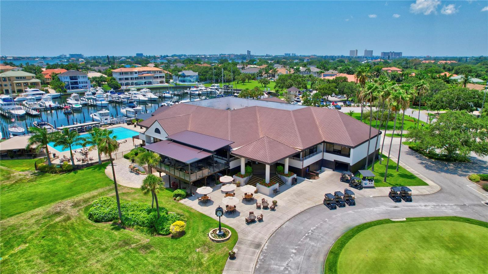 Master Club House, Jr Olympic Pool, Marina and Golf Club carts with storage.