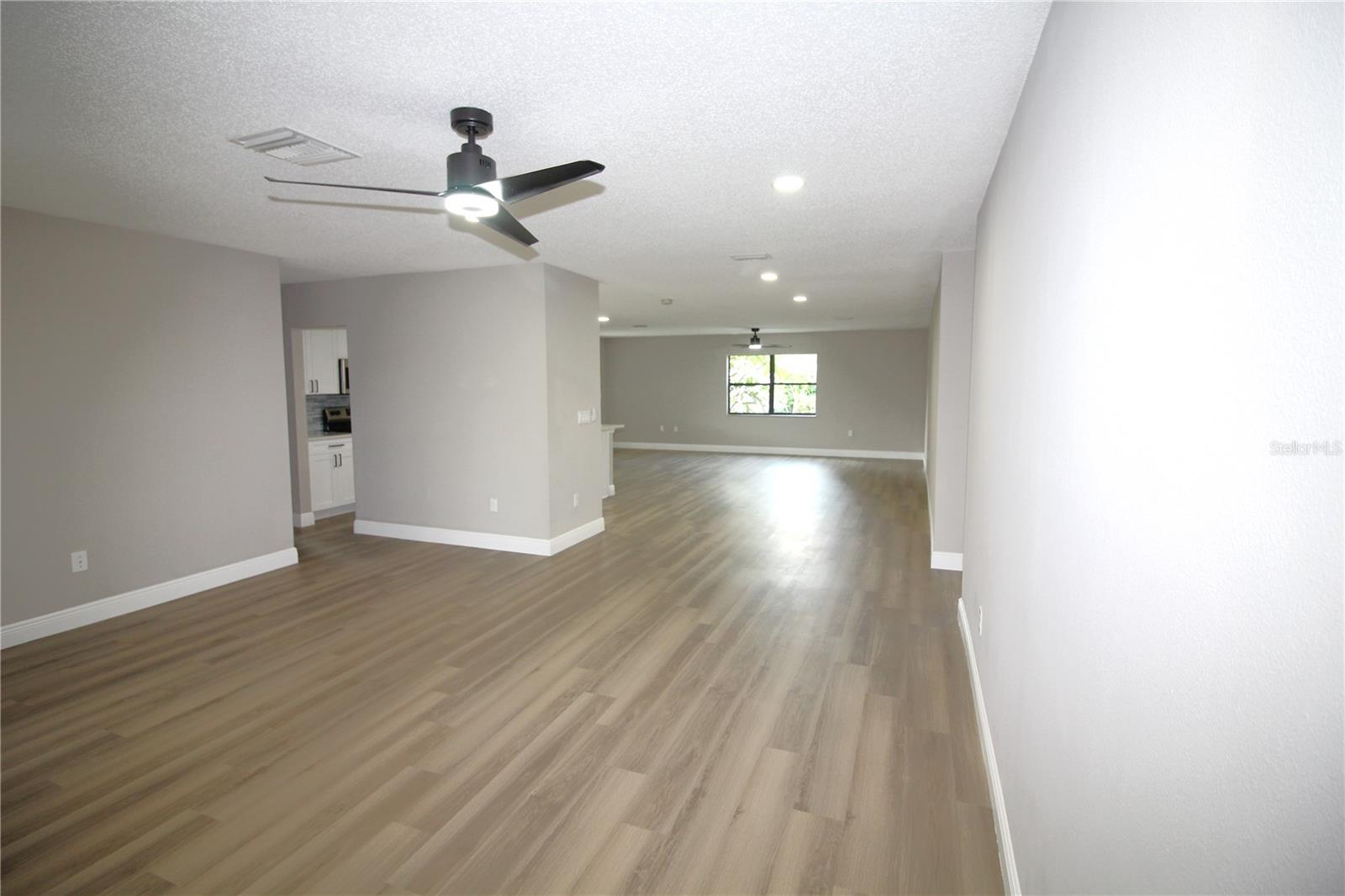Look from living room to dining/family room