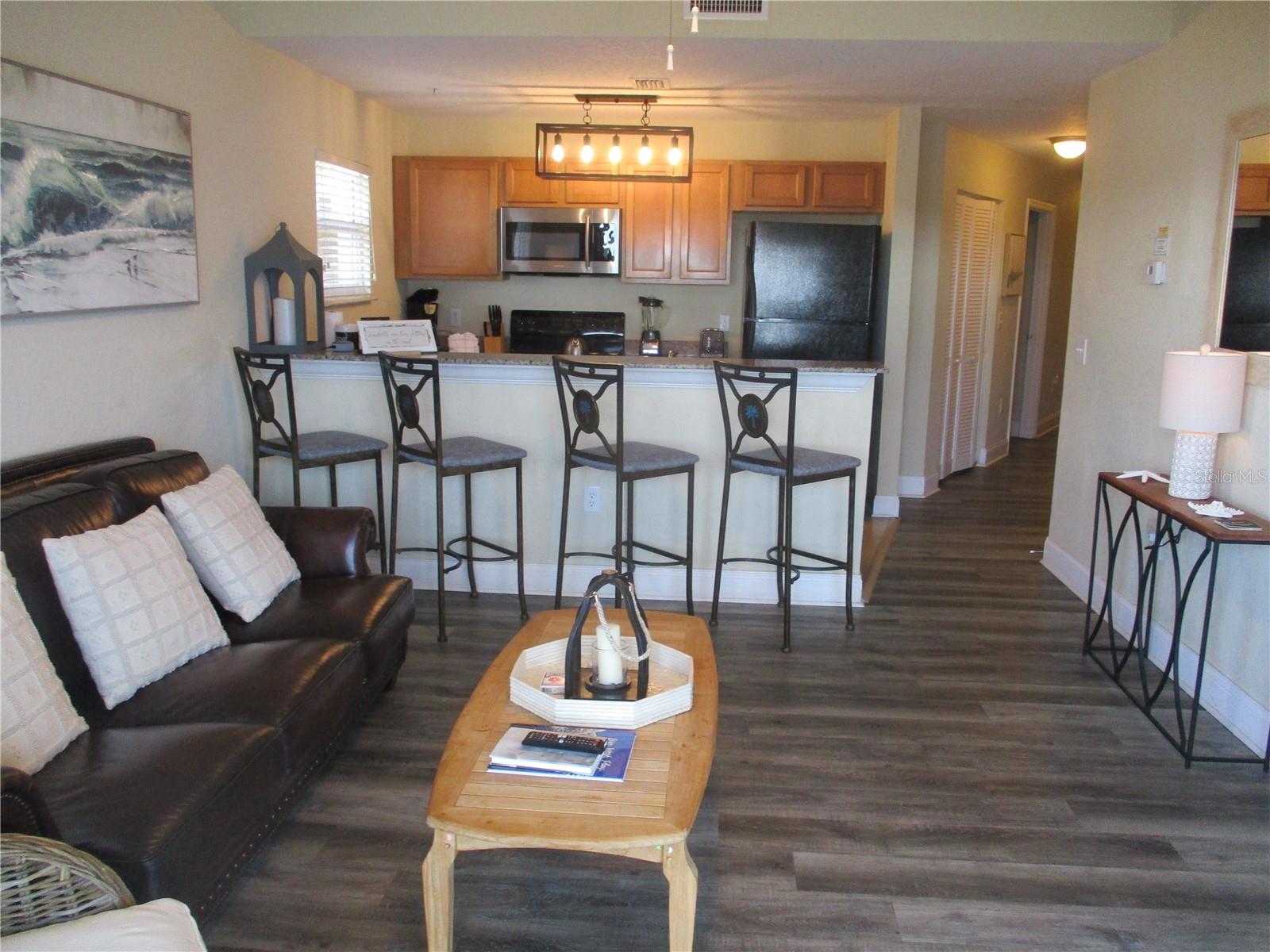 All newer Luxury vinyl flooring throughout the unit. Ceramic tiles in the kitchen and Baths.
