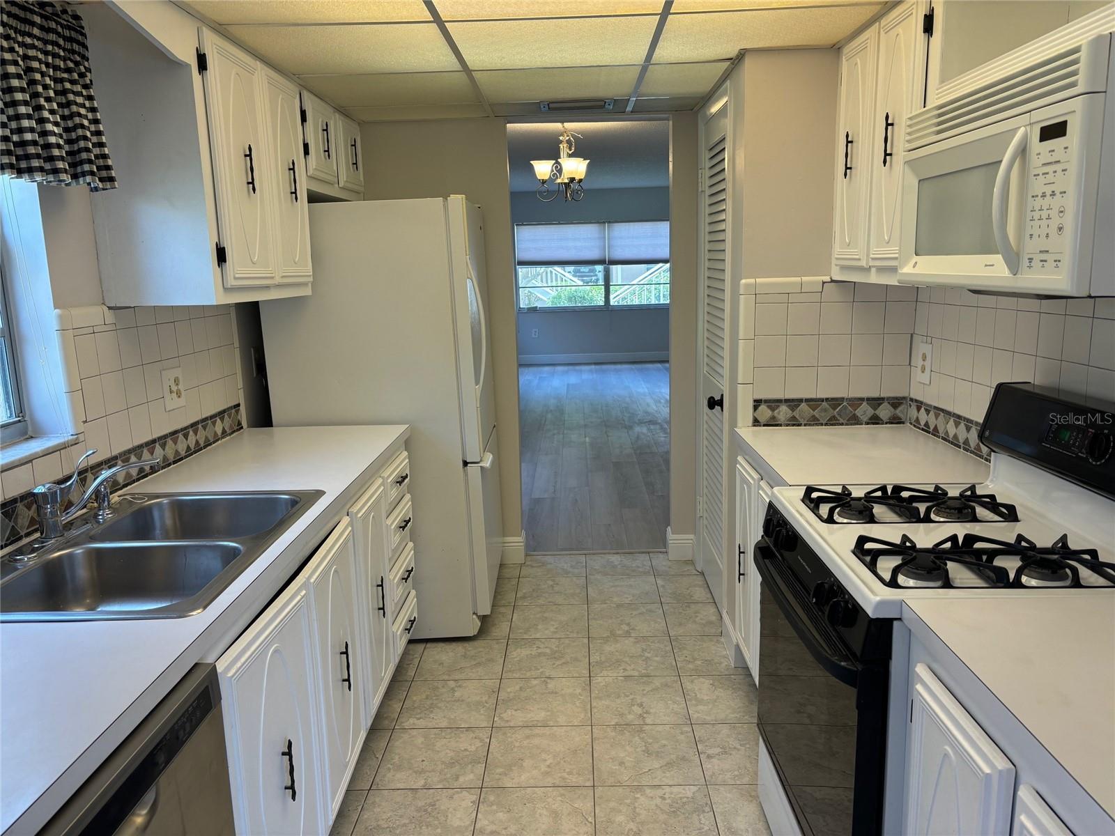 Spacious Galley Kitchen; View Into Dining And Living Rooms