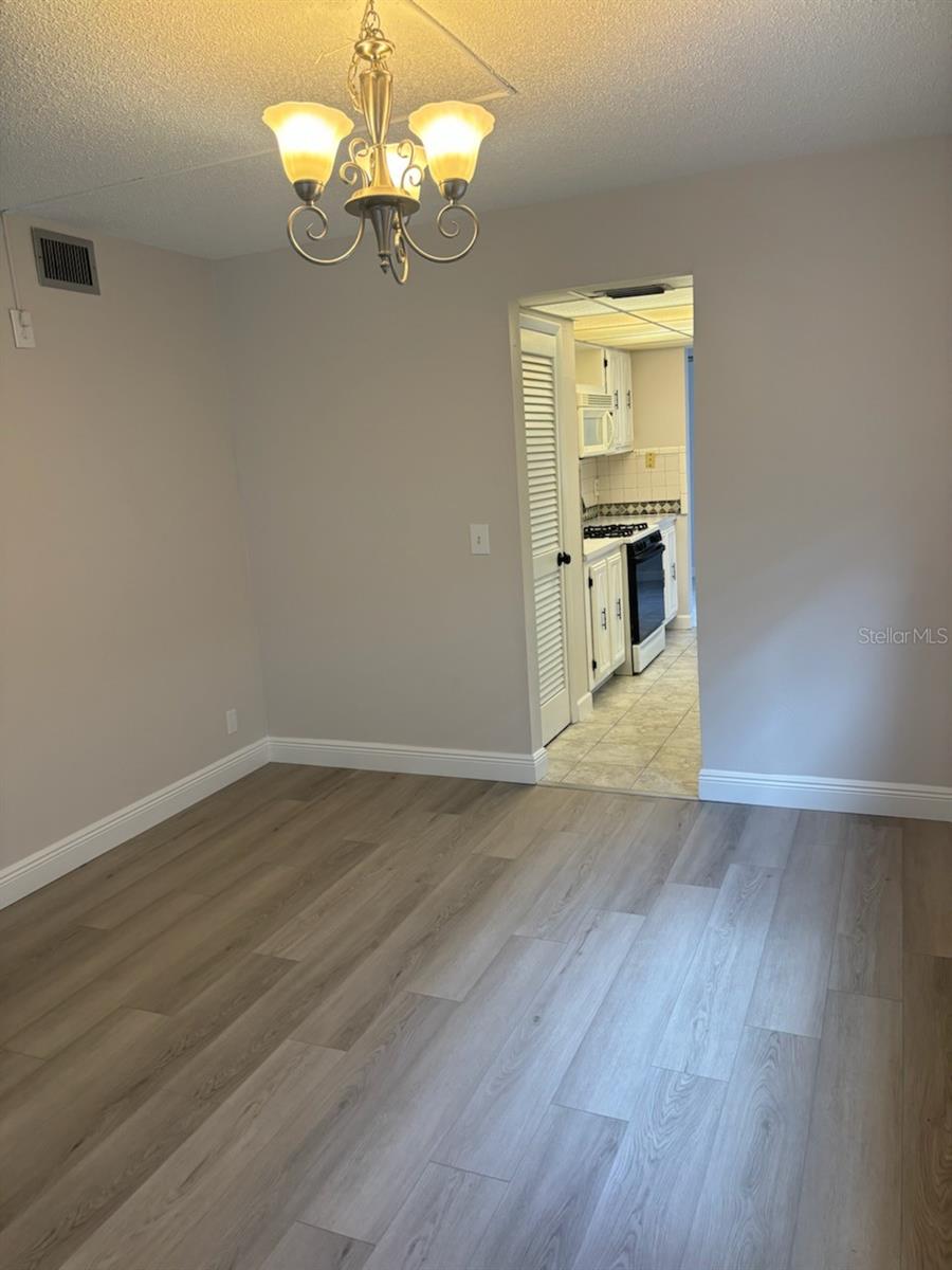 Dining Area/View Into Galley Kitchen