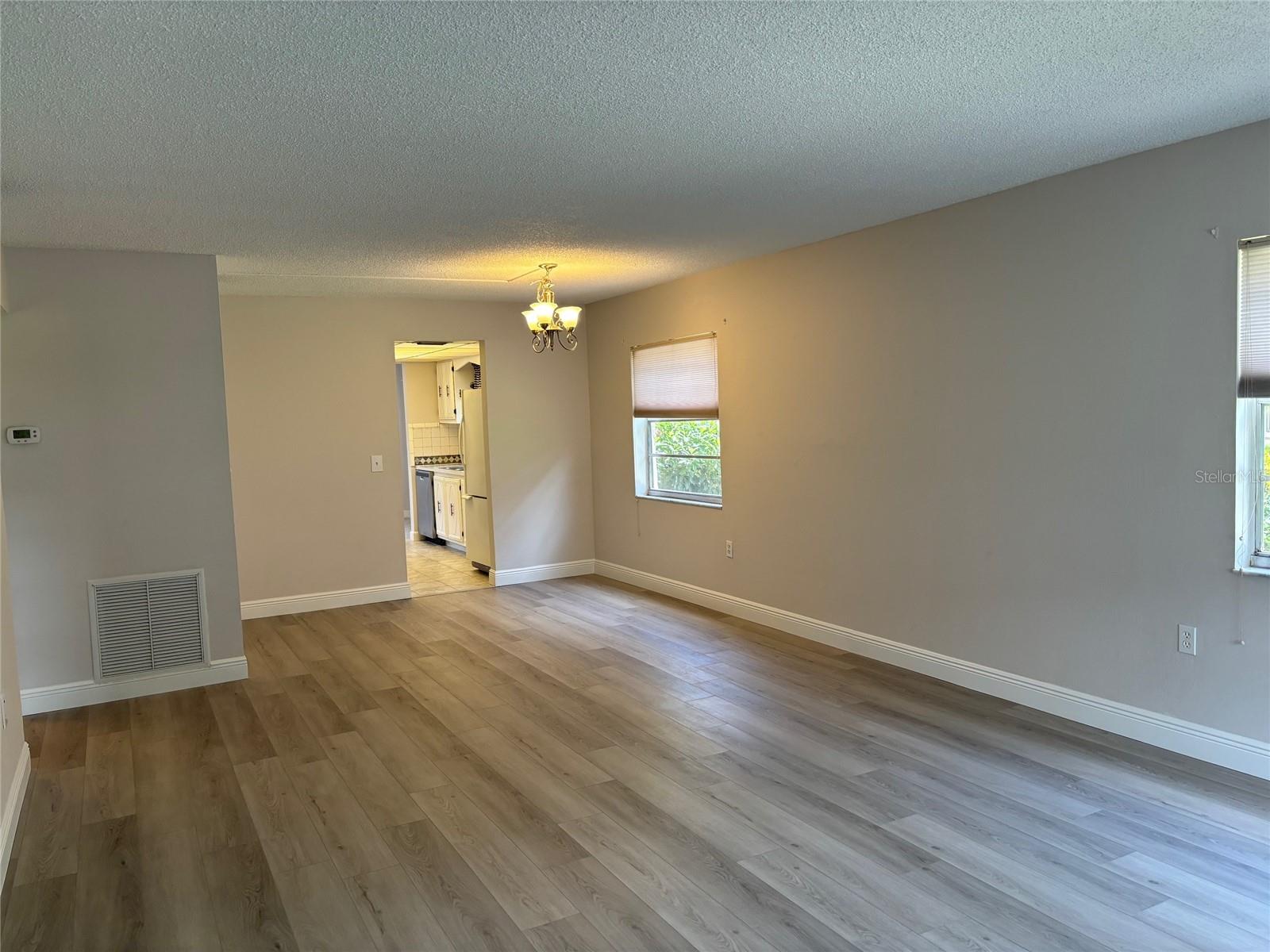 View From Front Door Into Living Room And Dining Room