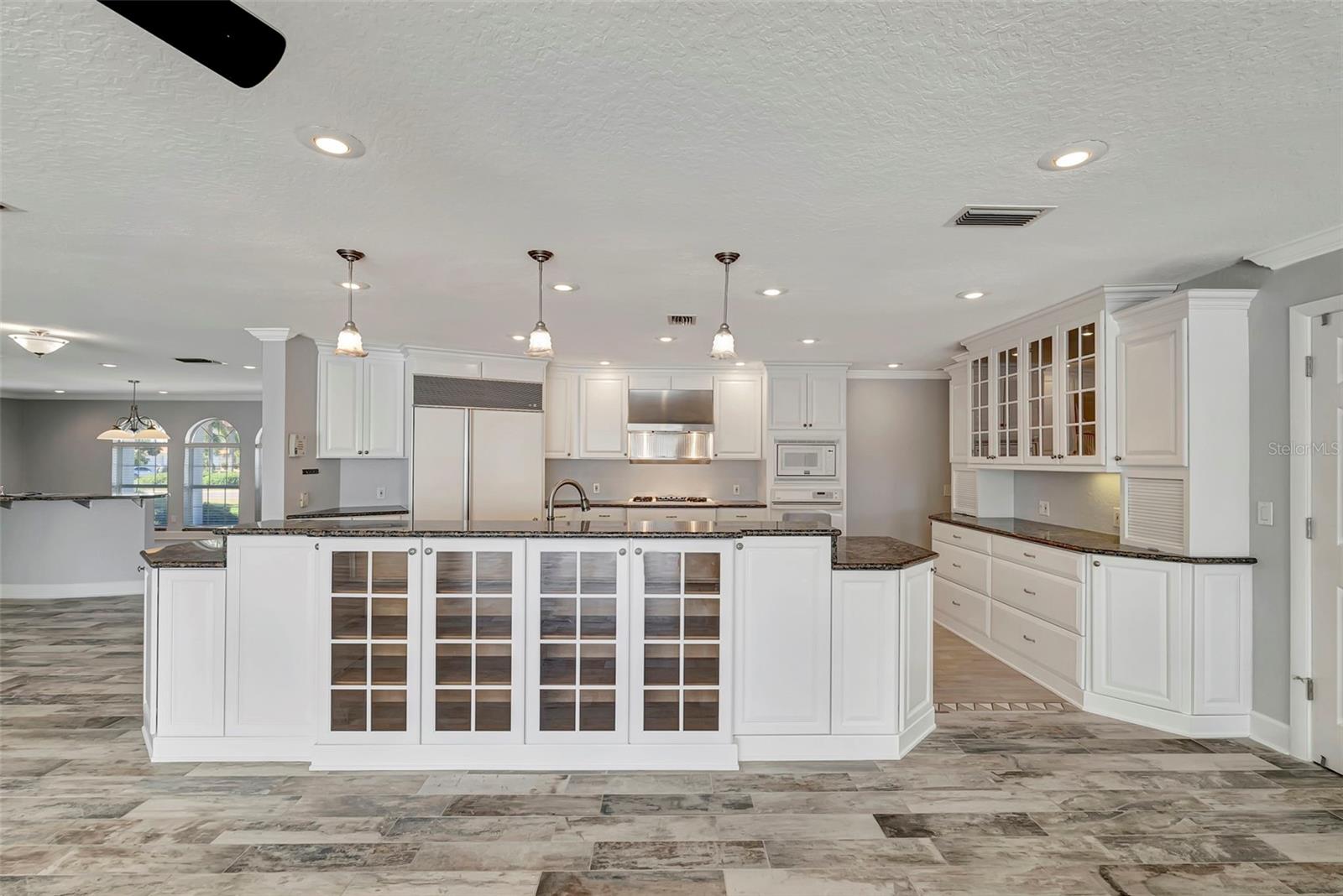 Welcome to the kitchen area, featuring stylish cabinets that blend seamlessly with the space.