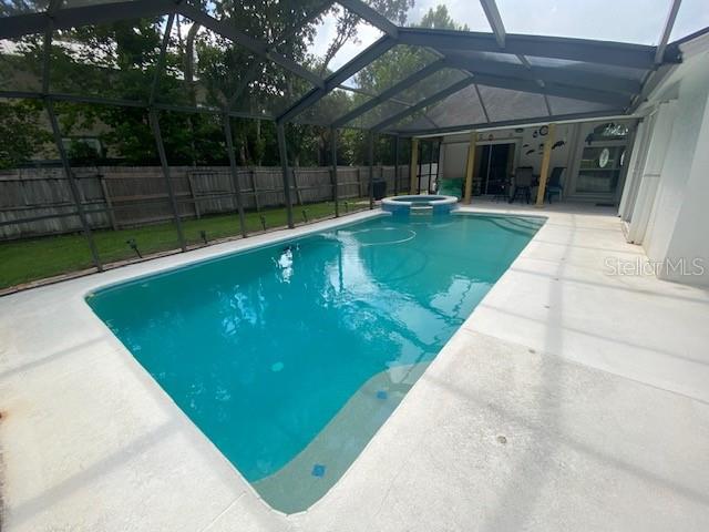 Screened pool with child protection fence inlays. Child safety fence provided.