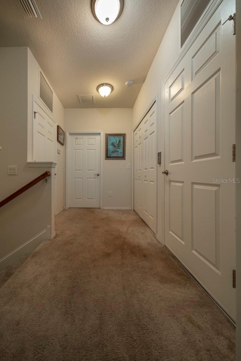 Top floor landing. Access to both bedrooms, laundry and elevator.