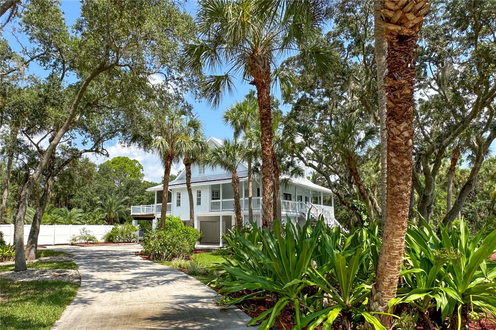 Circular Driveway in Front, plus Another Driveway to Covered Parking