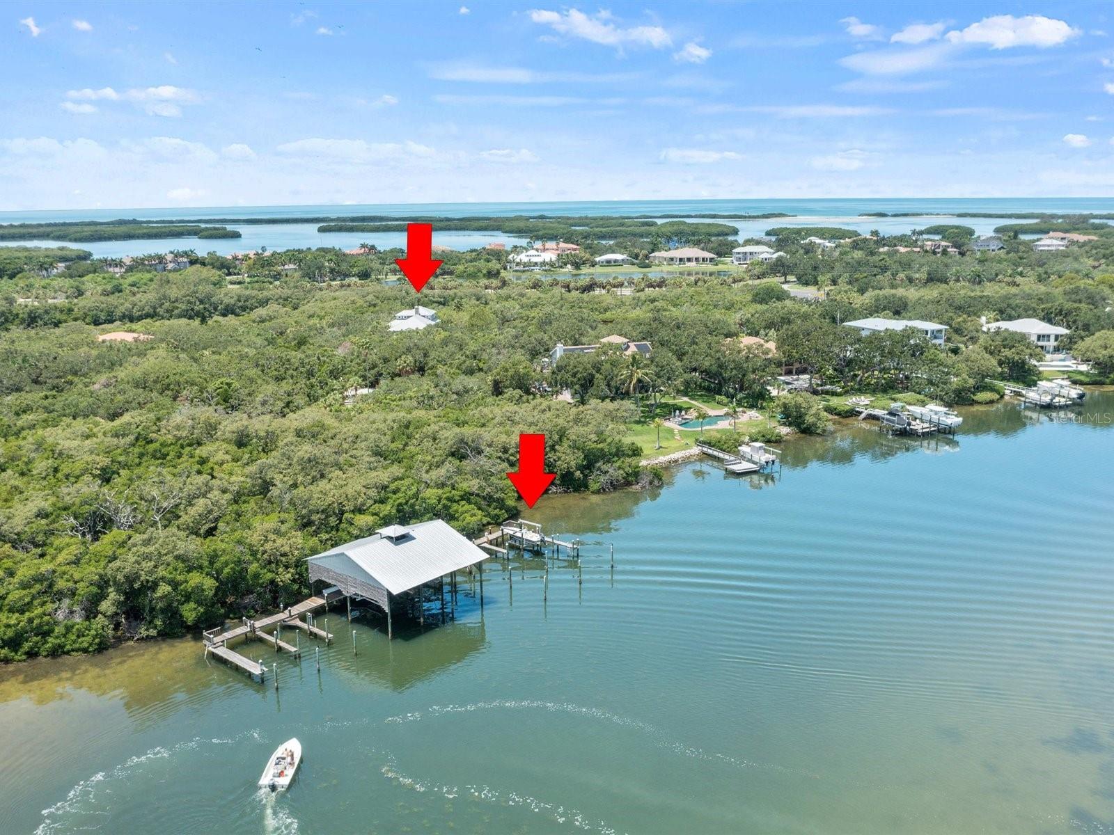 Arrows show home location and deeded dock location.