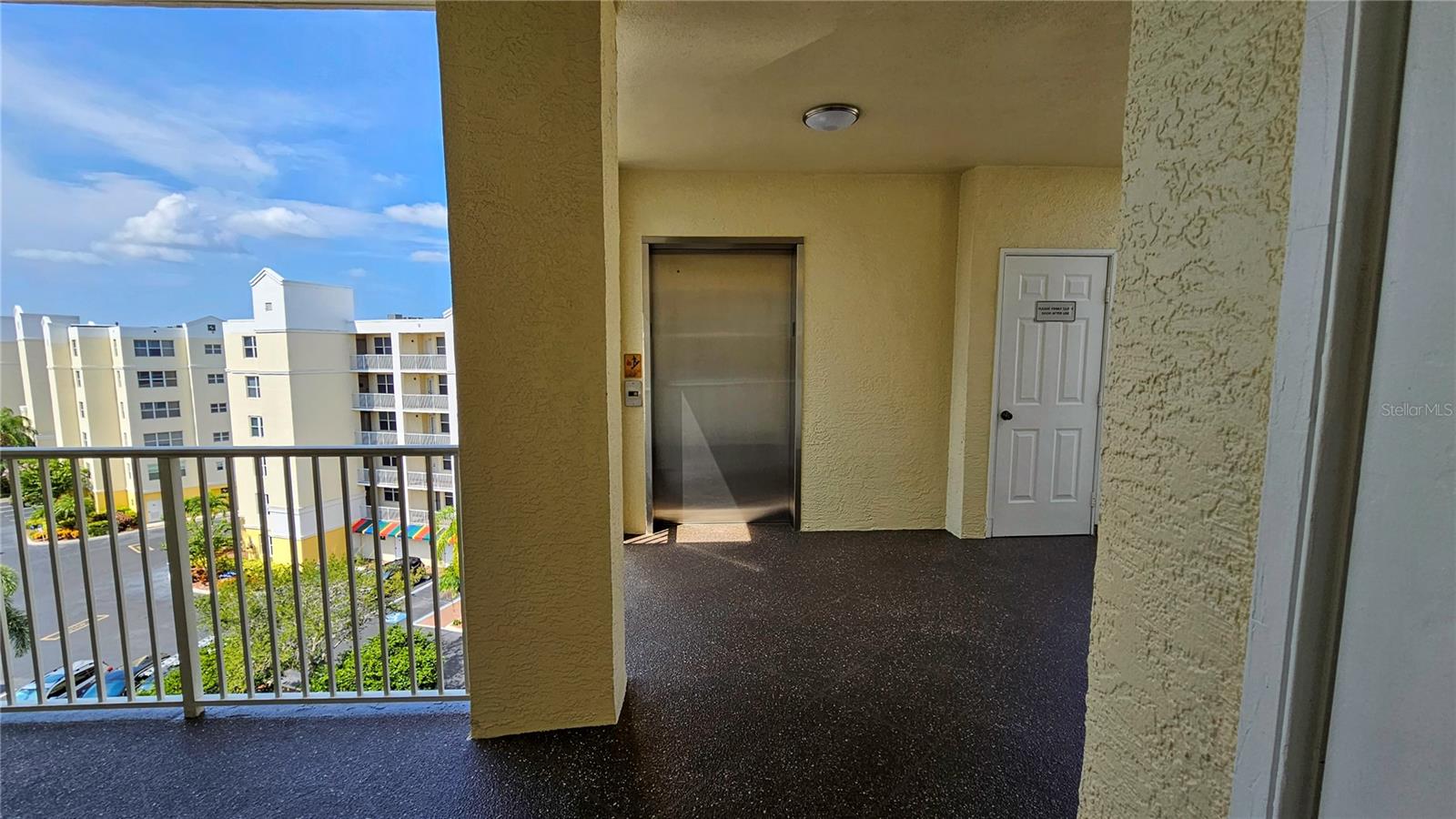 Elevator & Laundry Chute is right across the hall from your door!