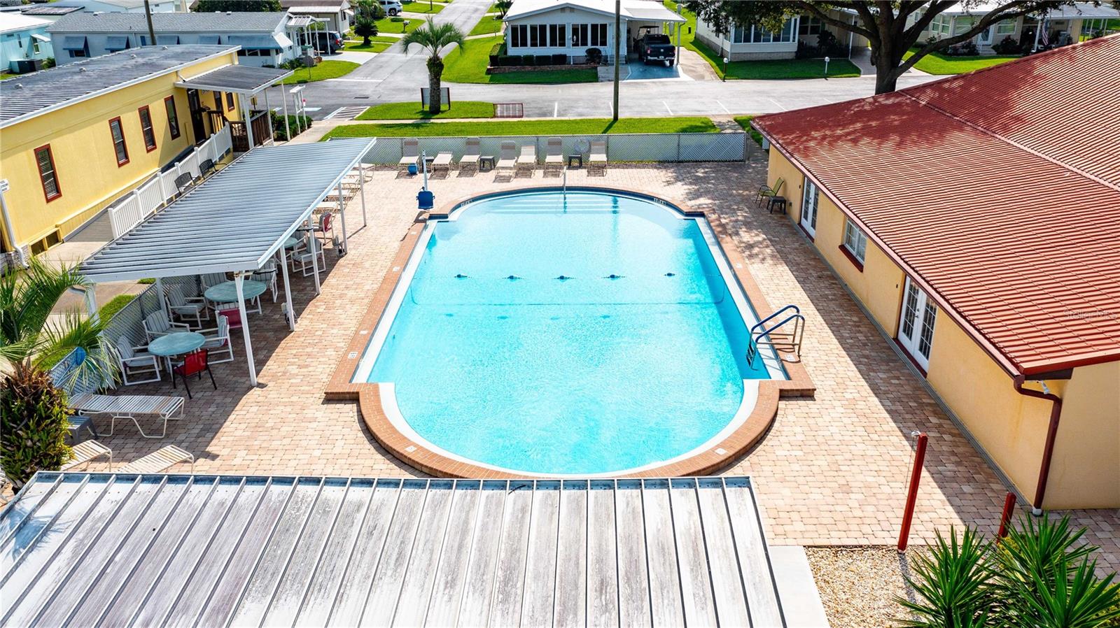 Outdoor heated pool in this community.