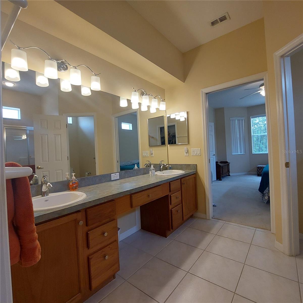 large master bathroom with double-sink vanity