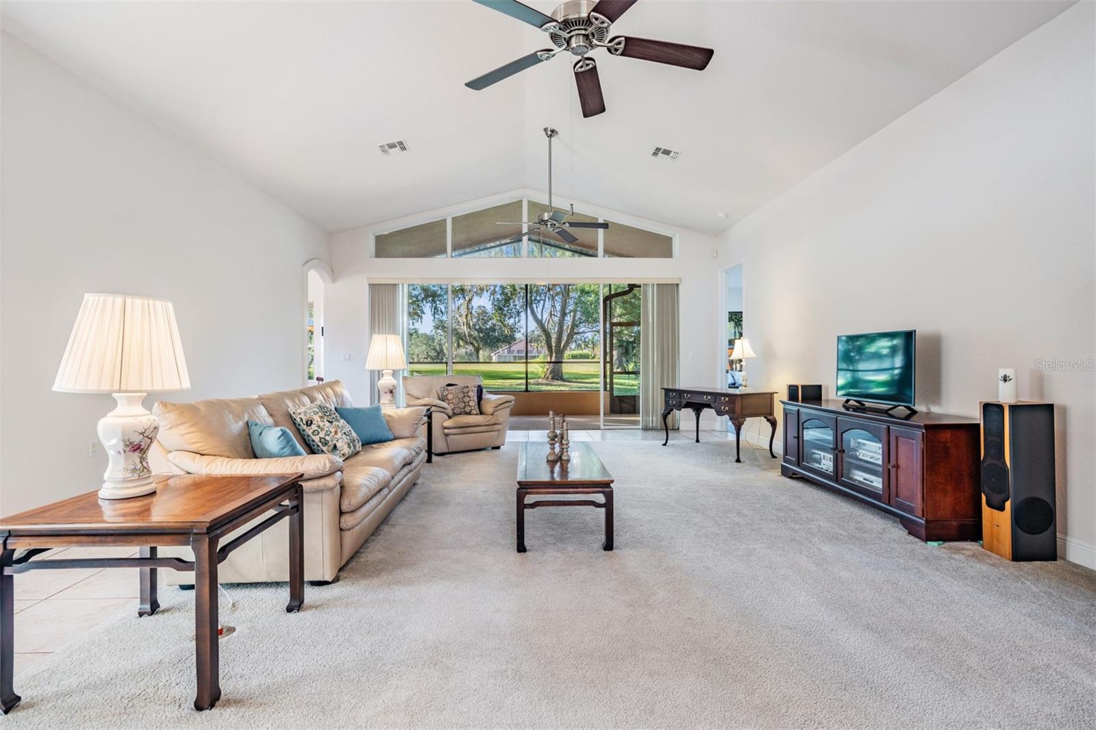 GREAT ROOM  with sliding doors to lanai frames the view and offers cross breezes!