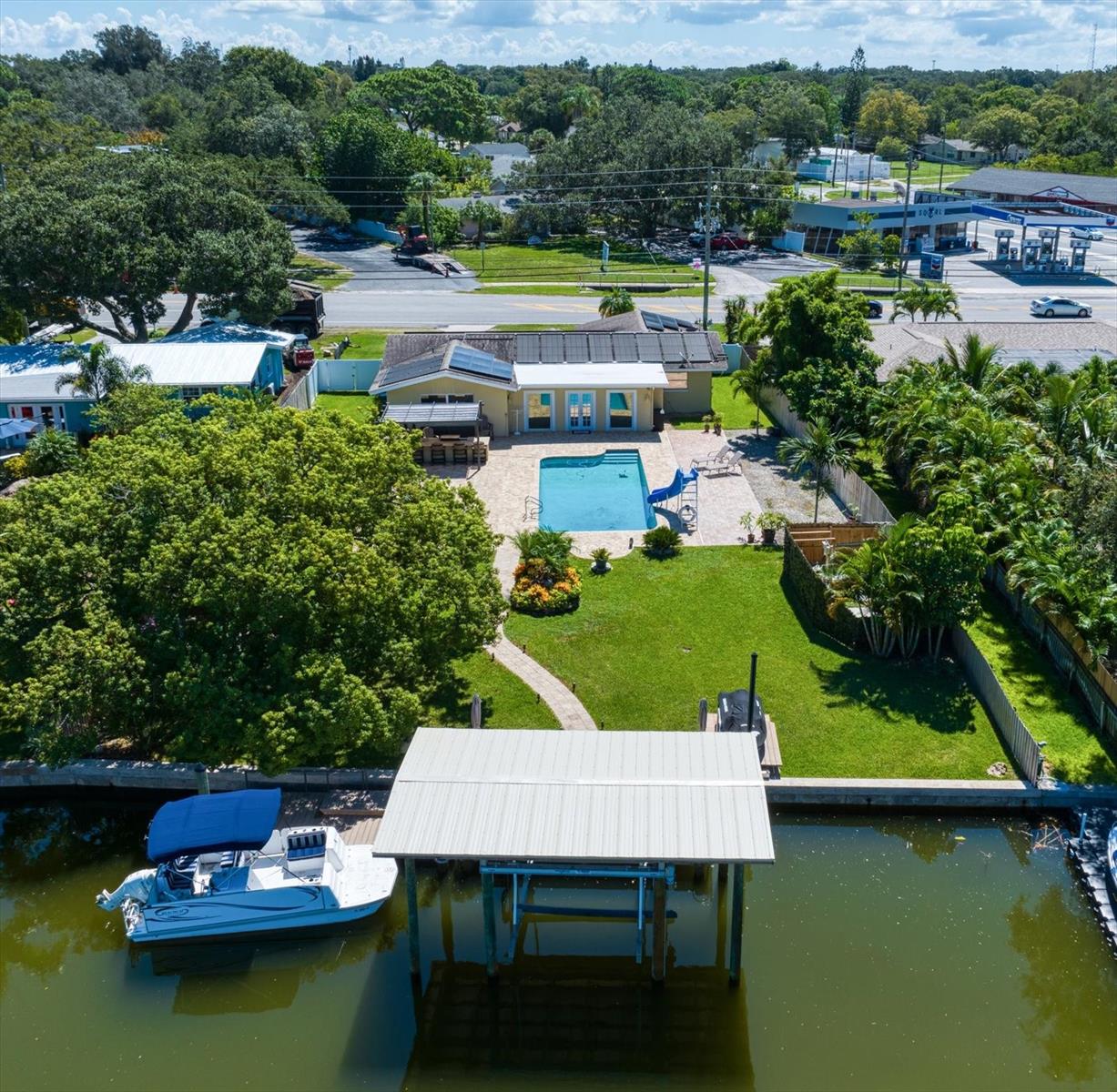 Superb dockage set up with rare covered boat house, floating dock and lift.