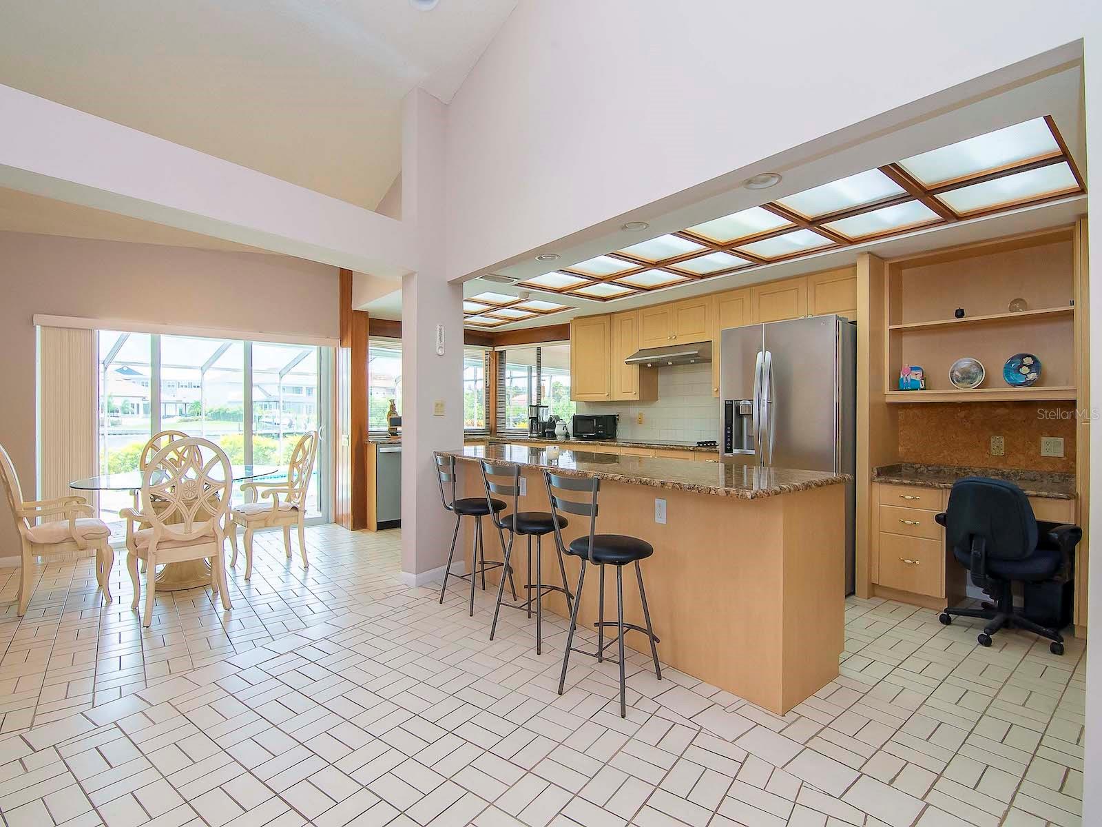Kitchen with view of the pool and waterway