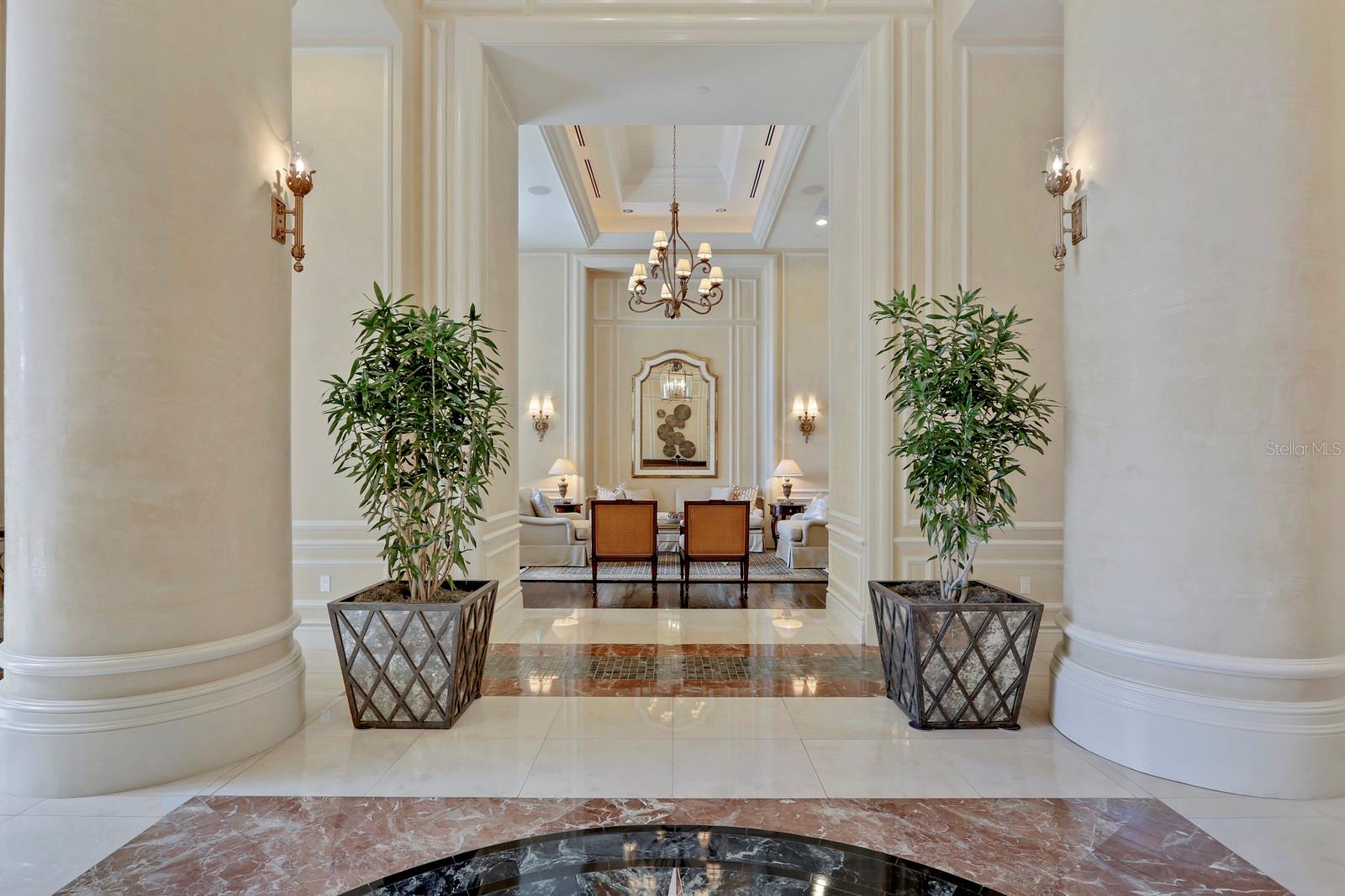 Once you enter the luxurious lobby, there is a lovely sitting room to the left for your guests or clients to enjoy.