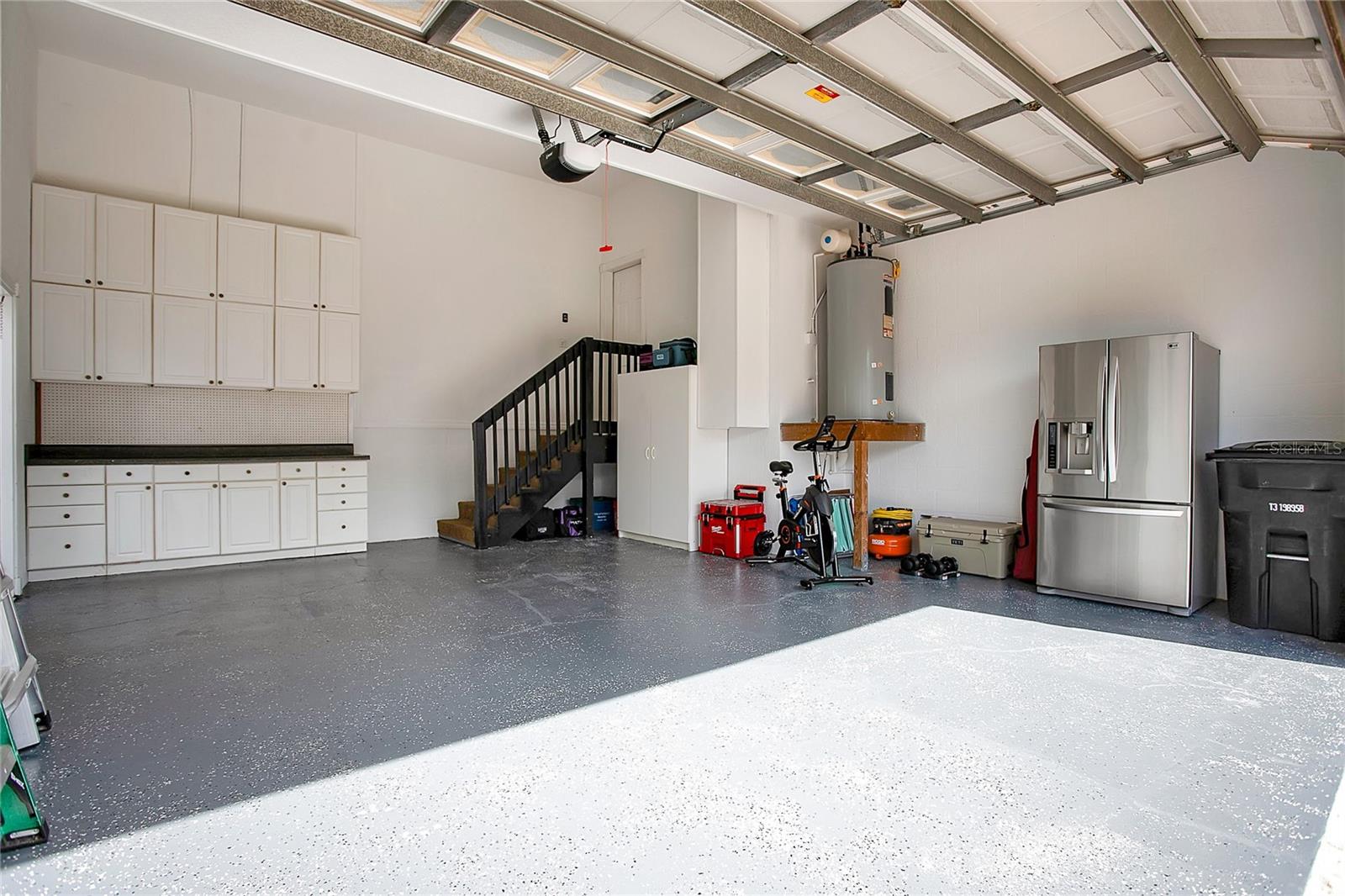 2 car garage with caninets