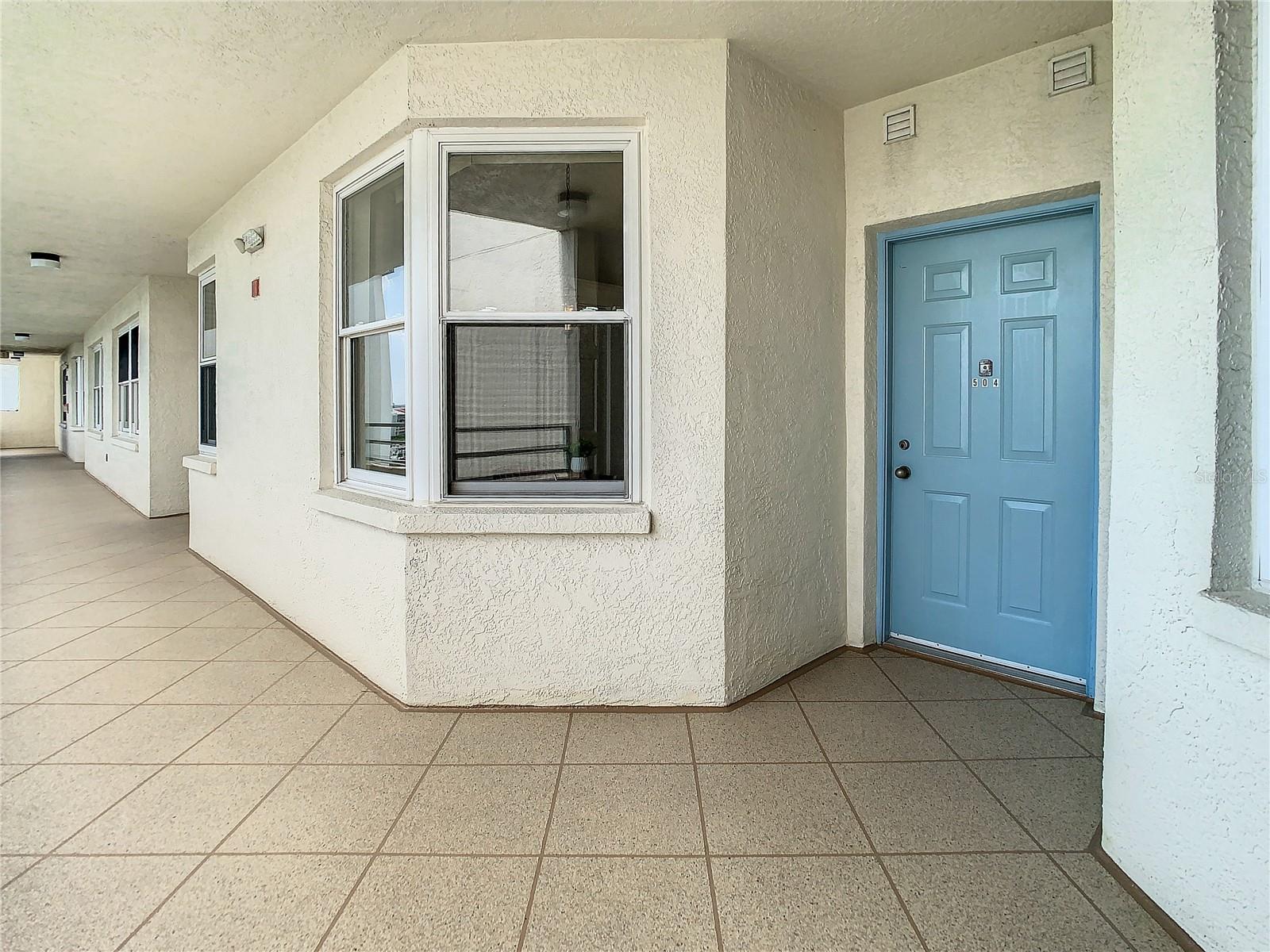 This is your entrance to this fabulous condo.  Notice the nice kitchen windows that you have for a great waterview from the kitchen