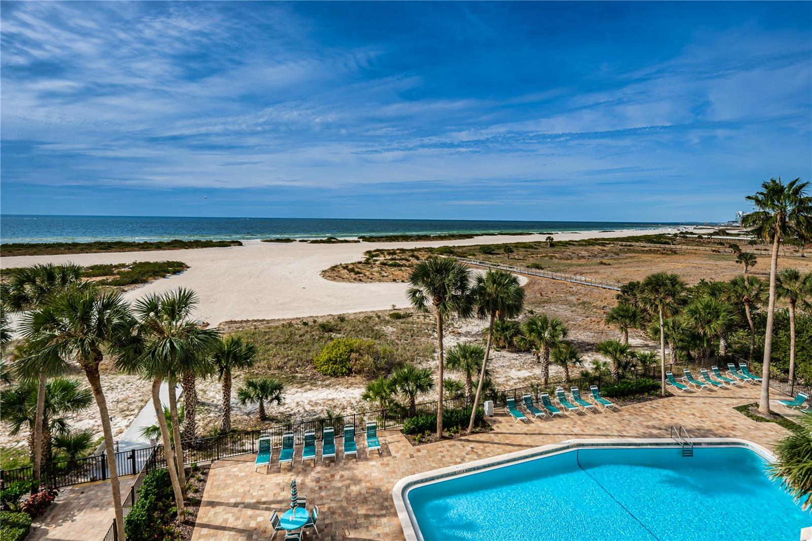 View from your balcony towards the community pool, beach and the gulf
