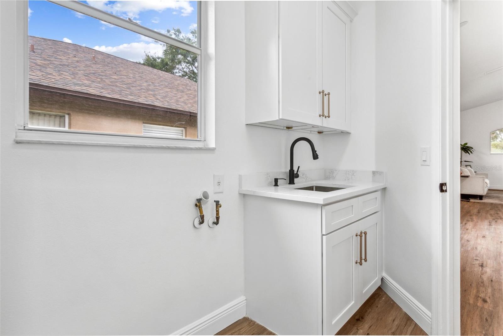 Laundry Room directly off Garage and Kitchen
