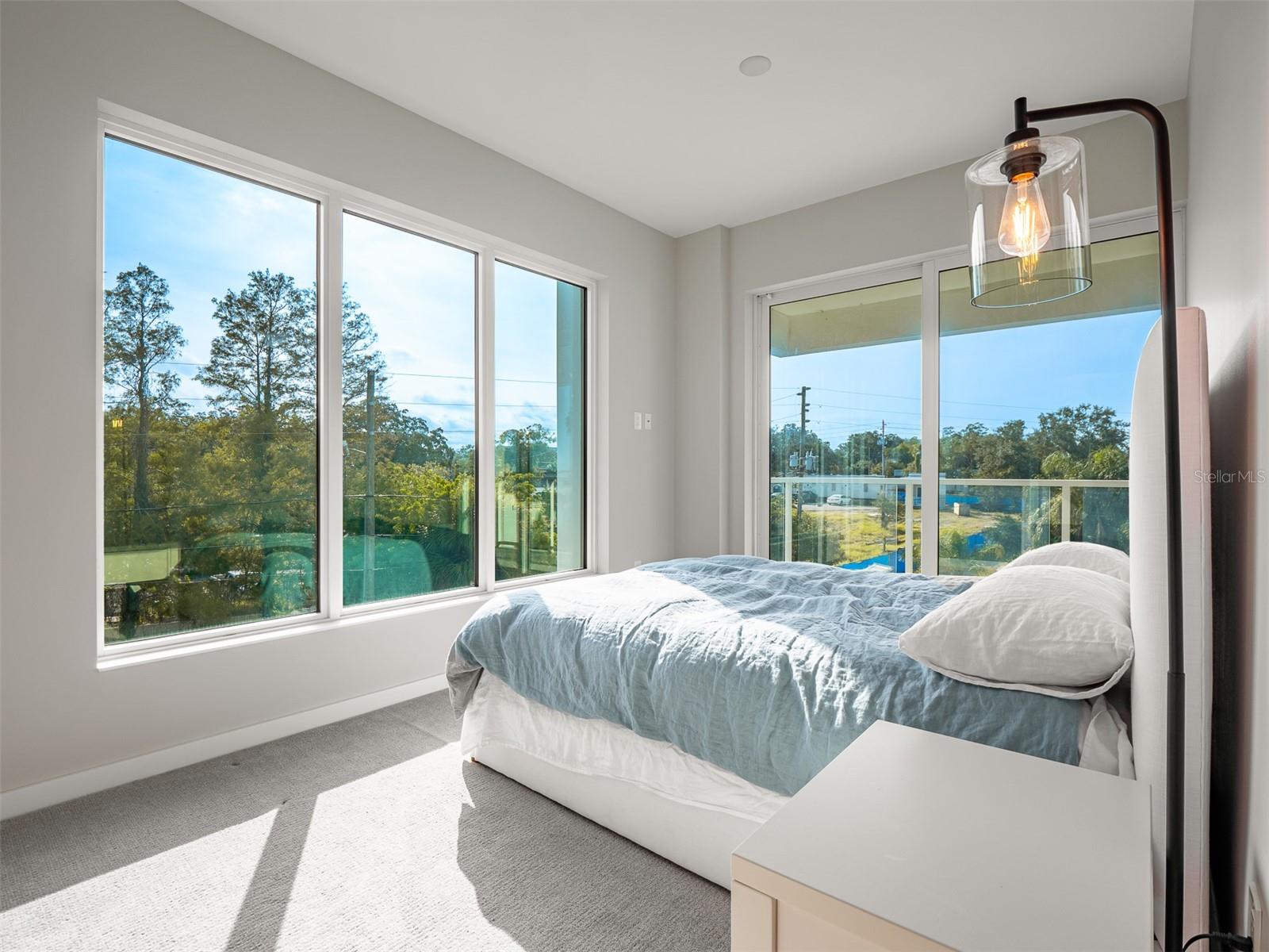 Second bedroom on the South-East corner for sunrise views and balcony