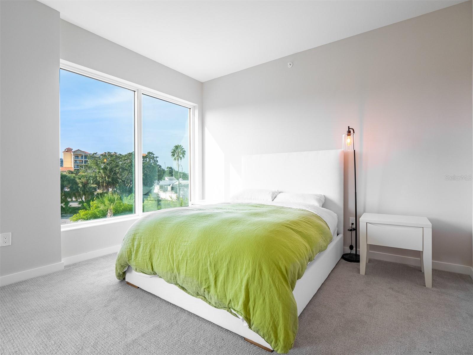 Third bedroom with South-East views and access to shared 2nd and 3rd bedroom balcony
