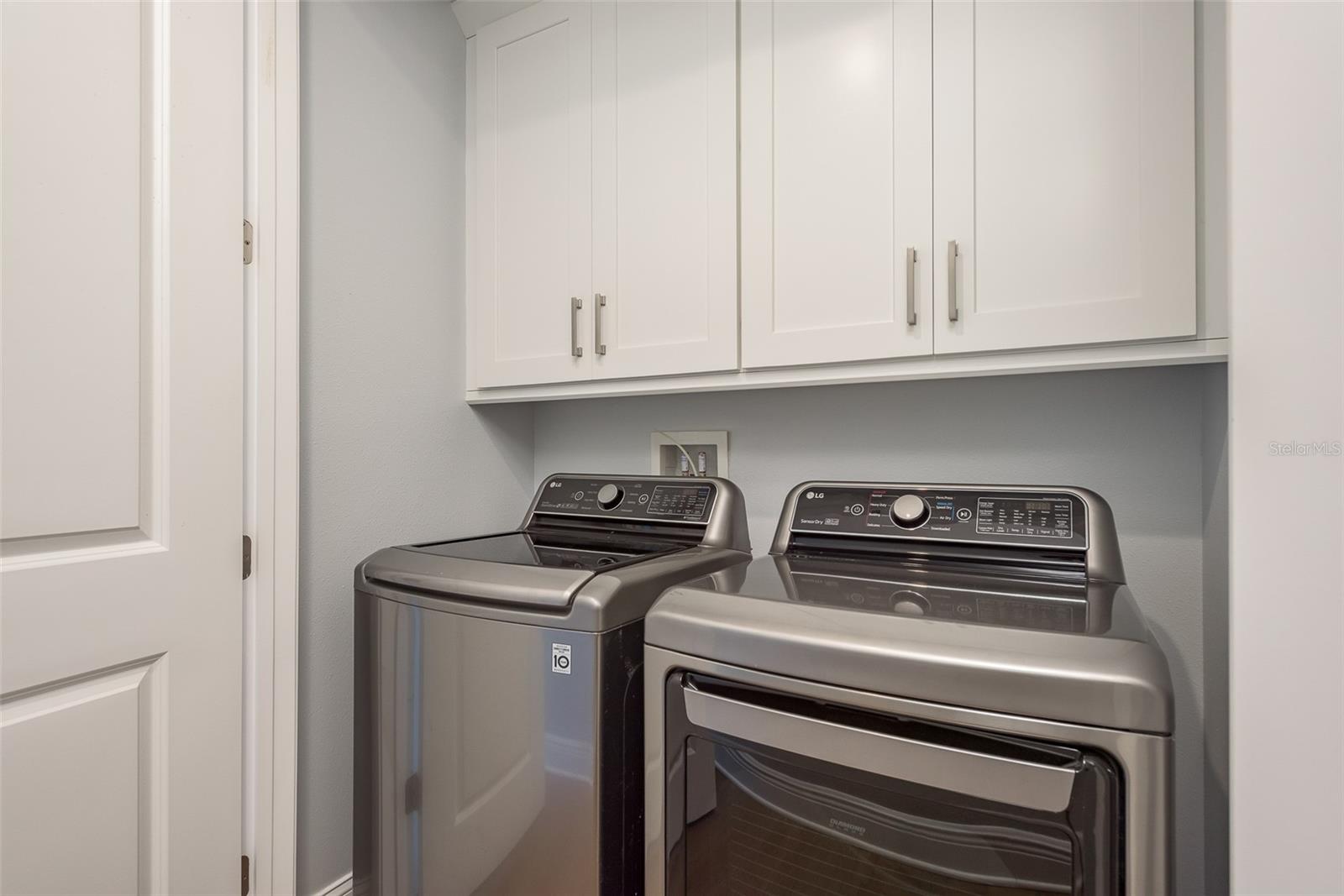 Conveniently tucked away, the inside laundry closet offers practicality and efficiency, ensuring that chores are seamlessly integrated into your coastal lifestyle, adding convenience to your daily routine.