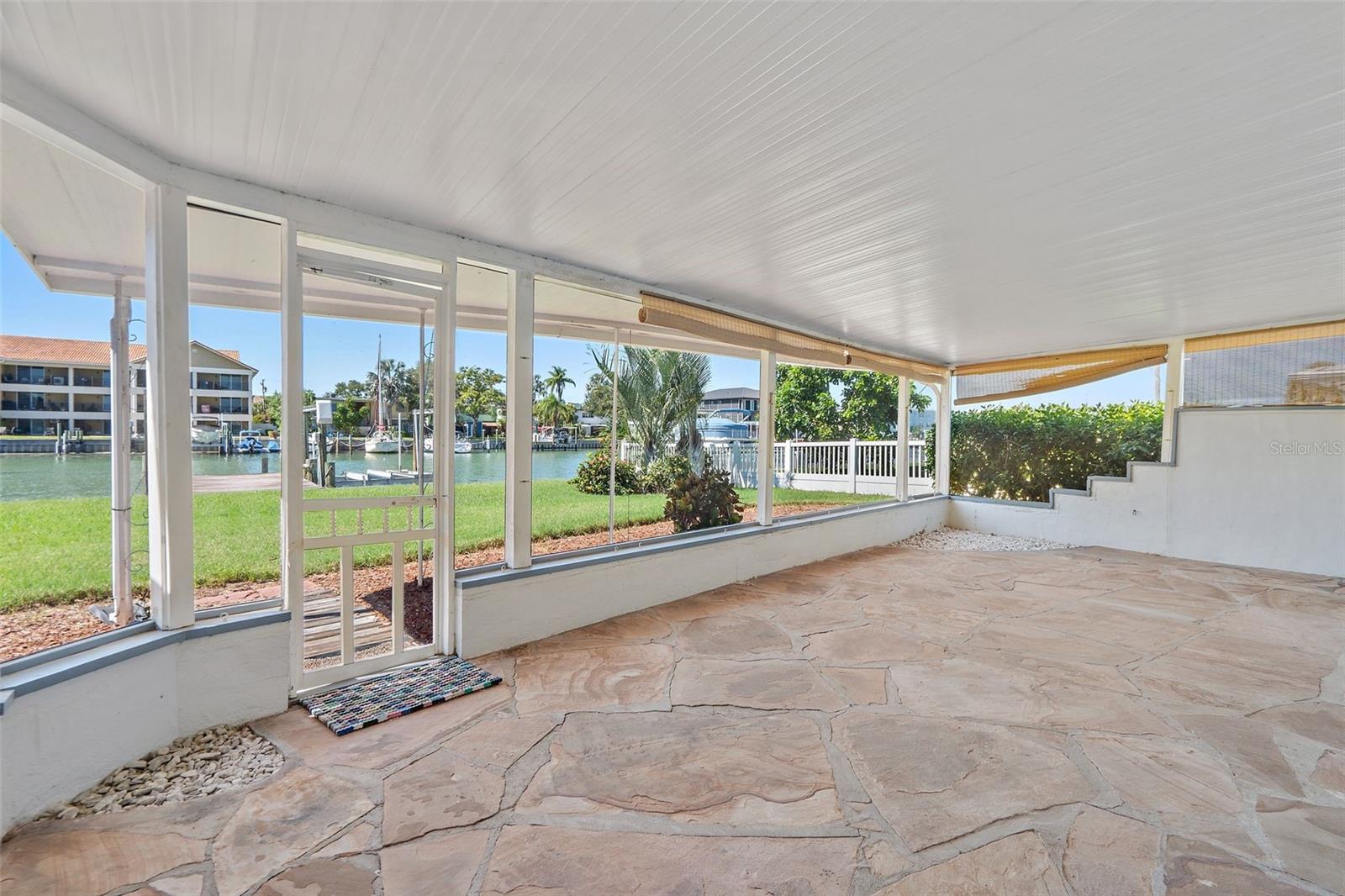 NICE SIZED "Outdoor Living area" from Fla Room / Screened Porch - an extension of inside living space for much of the year - OR a potential expansion area for a new Master Br??
