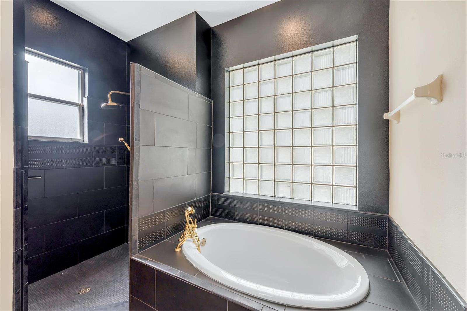 Master Ensuite with split vanities, garden tub, shower stall, water closet with Bidet