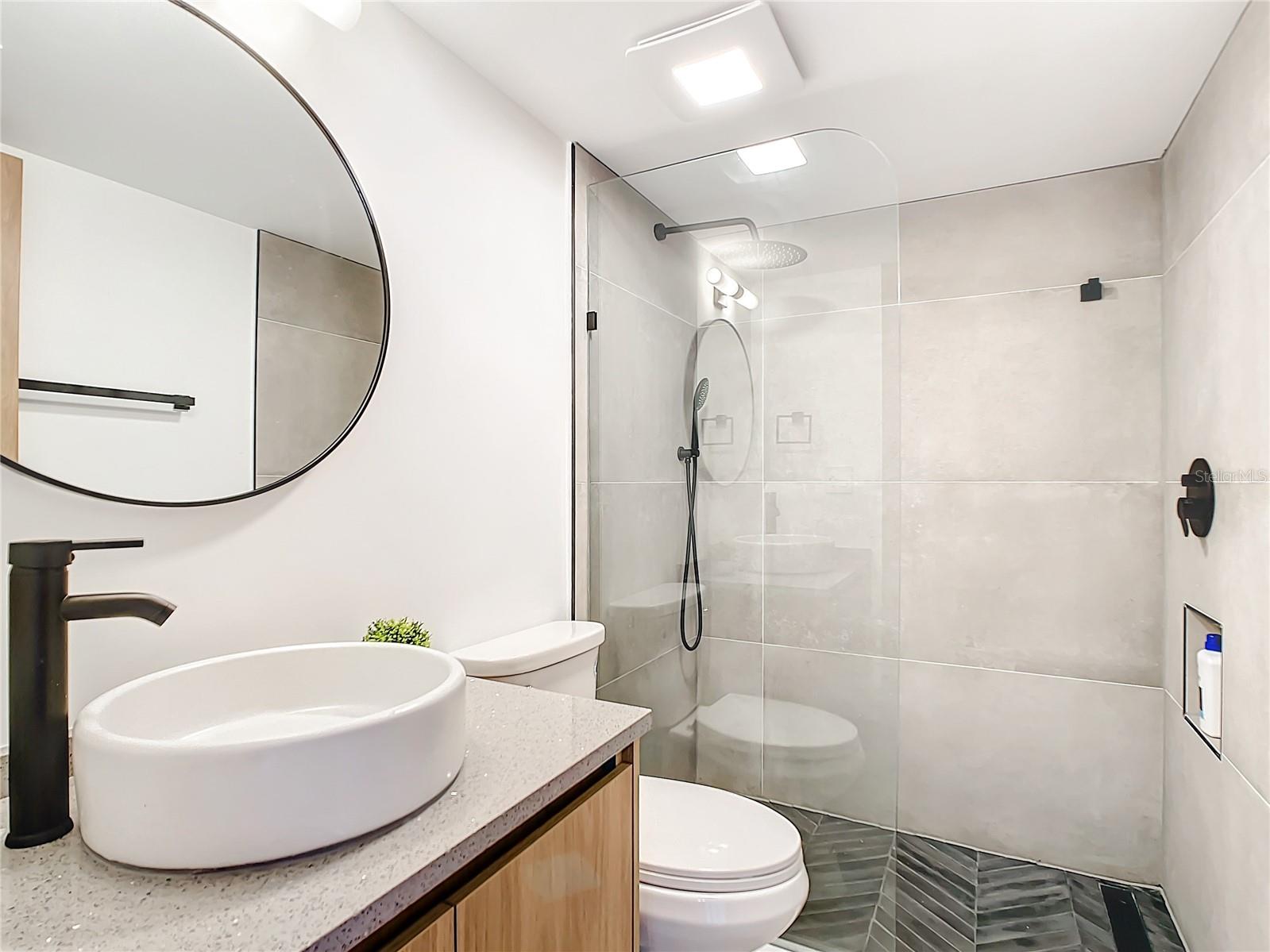 Secondary Bathroom with beautiful tile work and Glass shower 5532 PUERTA DEL SOL BLVD S, #136, ST PETERSBURG, FL 33715