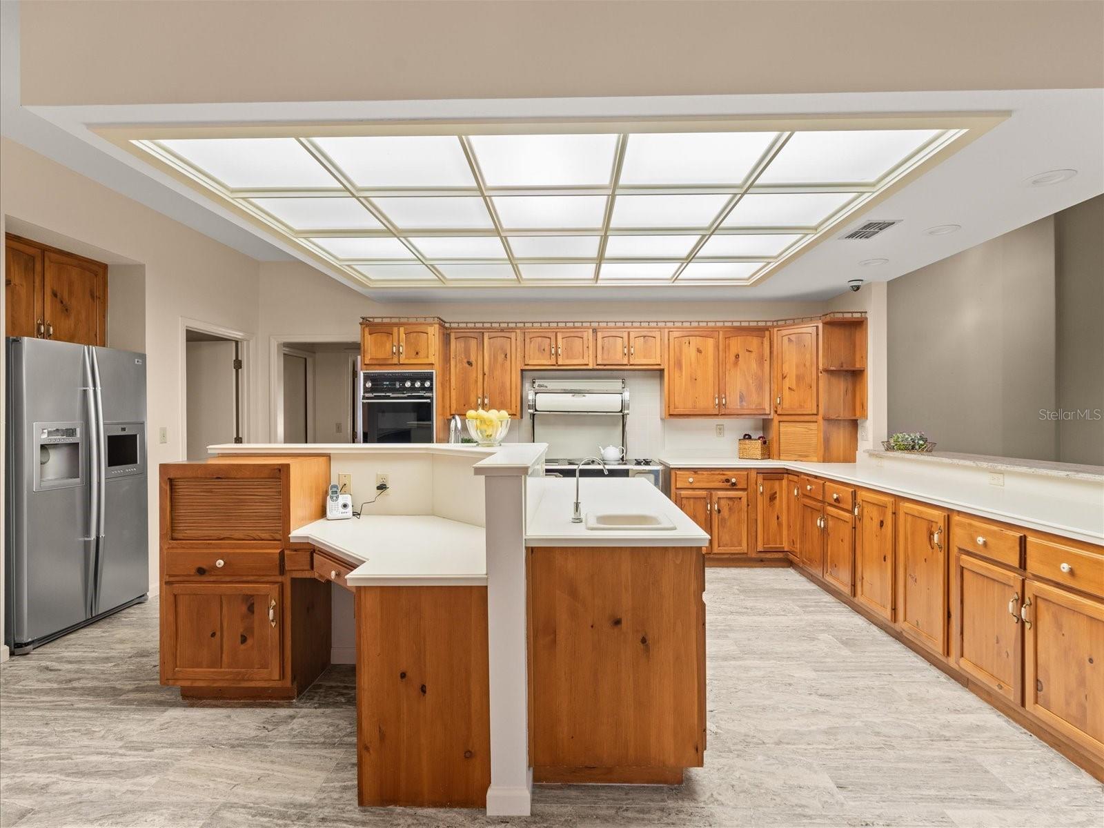 Abundantly large kitchen opens to large family room