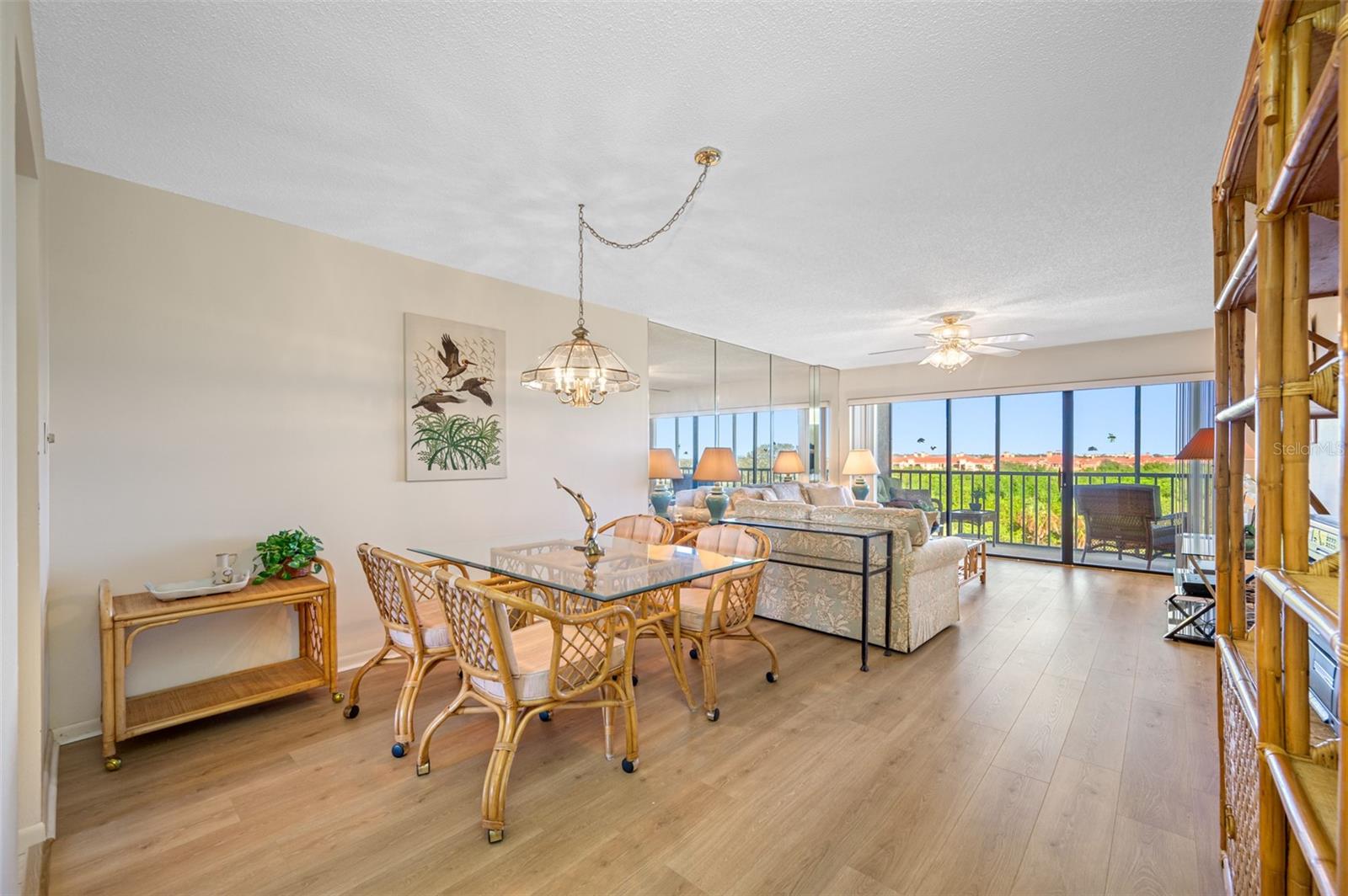 Living room and dining combination area, leading direct to the lanai and bay view.