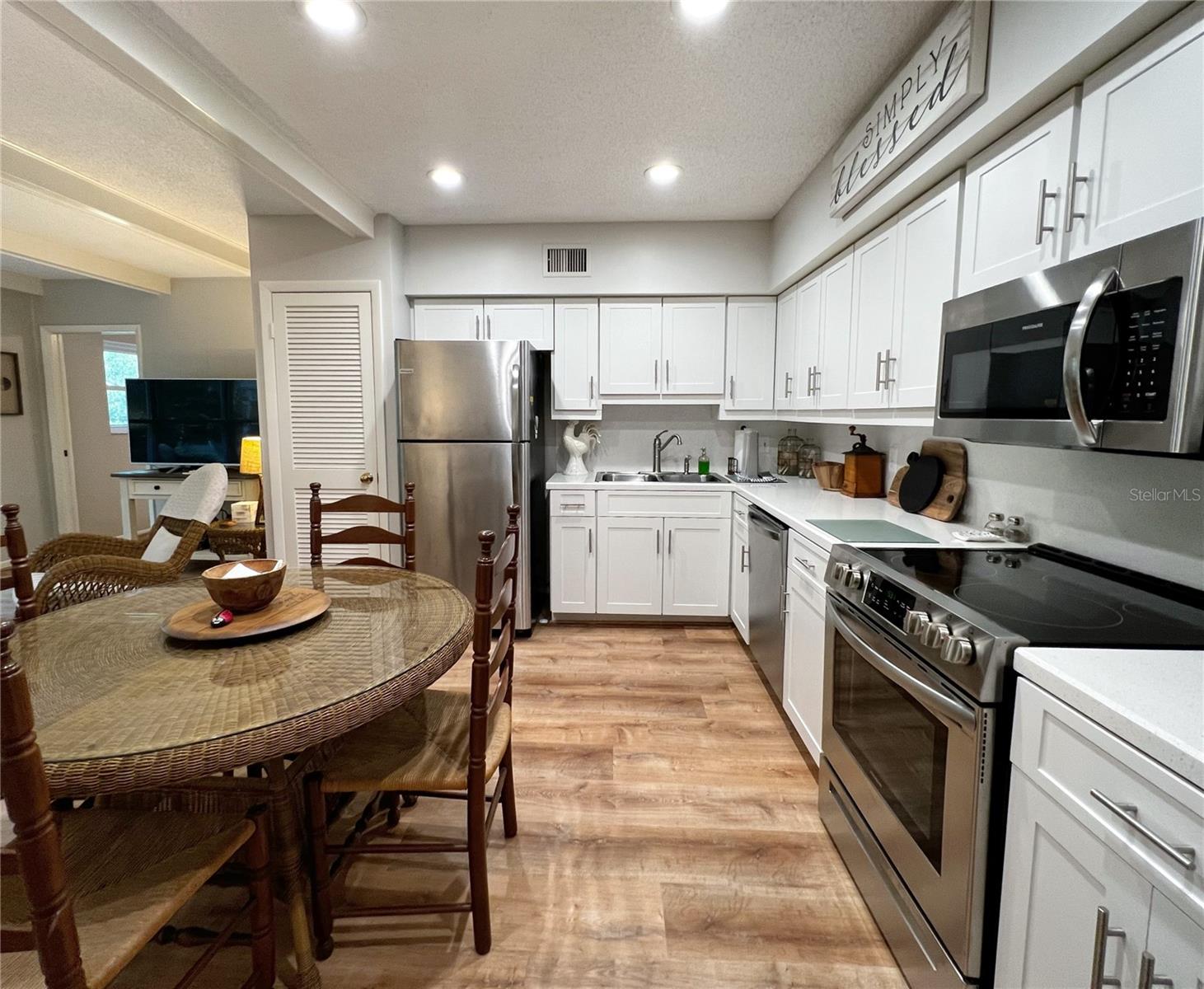 Remodeled kitchen with stainless steel appliances.